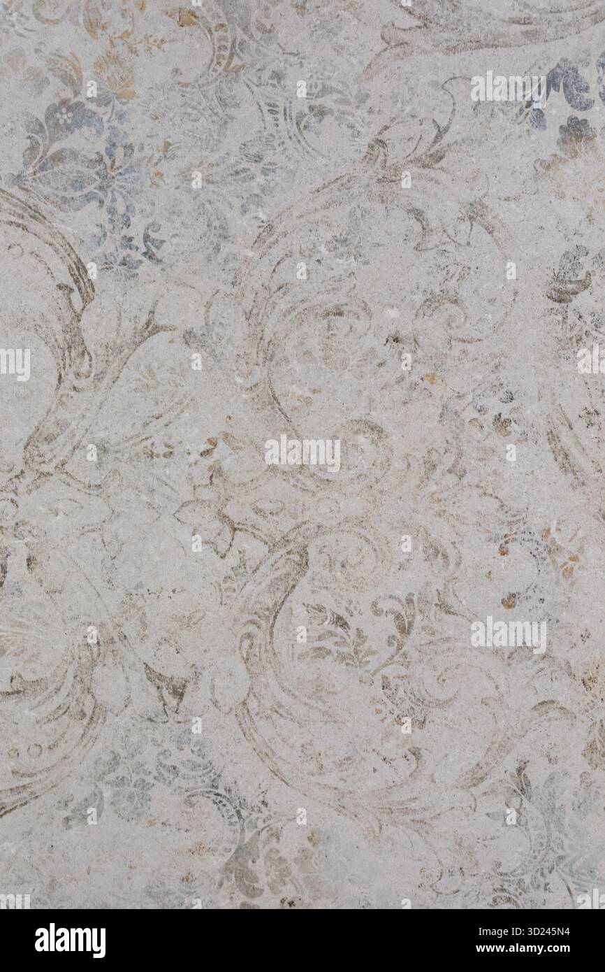 Dekoratives graues und weißes Muster auf glatter Oberfläche, das komplizierte Designs und Texturen hervorhebt Stockfoto