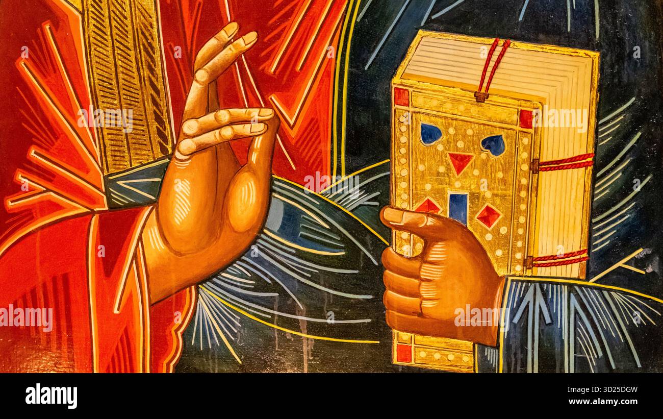 Detail einer religiösen, ikonischen Illustration, die eine Geste des Segens und ein Buch zeigt Stockfoto