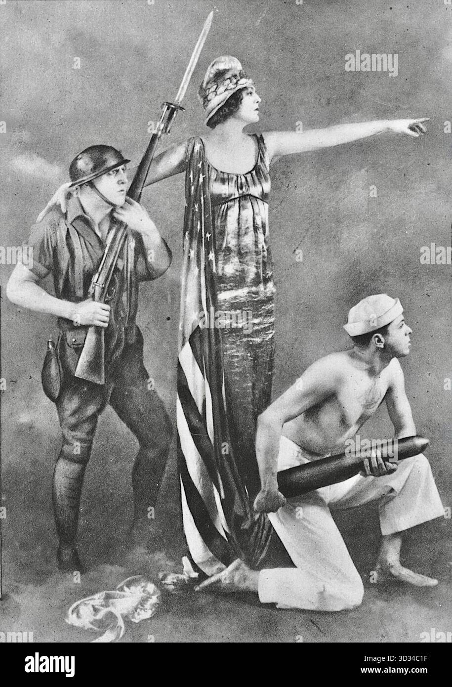 Ben Ali Haggin – US-amerikanischer Porträtmaler und Bühnenbildner. Bekannt wurde er durch seine Porträts prominenter Gesellschafterinnen und Theaterdarstellerinnen sowie durch die Gestaltung von „Tableaux vivants“ (lebende Bilder) für die Ziegfeld-Follies von 1917 bis 1925. Das zur Verfügung gestellte Bild ist ein Foto eines solchen patriotischen Tableaus mit dem Titel America Answers, das von Haggin arrangiert wurde. Die Schauspielerin Ethel Barrymore ist die Hauptfigur der Liberty. Dieses spezielle Tableau war Teil einer Serie, die für Propaganda oder Spendenaktionen verwendet wurde, wie zum Beispiel das nationale Rote Kreuz-Pageant 1917 und Liberty Loan Stockfoto