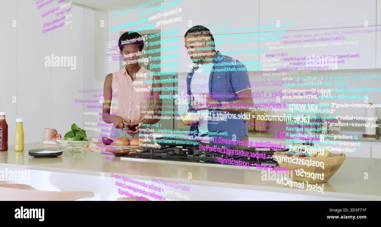 Kochteam mischt Kodierung mit Mahlzeitvorbereitung und zerkleinert Gemüse auf der Kücheninsel, Code-Overlay Stockfoto