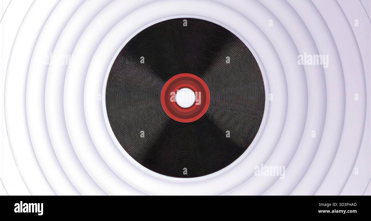 Mit einer rekordähnlichen Scheibe mit rotem Ringloch auf grauen, konzentrischen Graten im Hintergrund Stockfoto