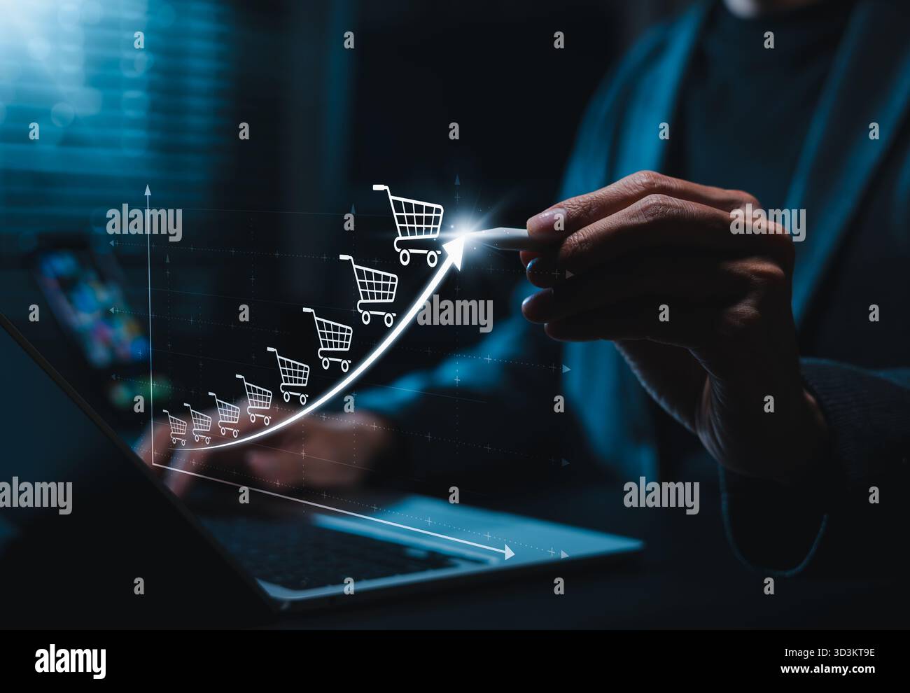 Wachstumskonzept des elektronischen Geschäftsverkehrs. Grafik mit aufwärts steigenden Warenkorbsymbolen, die steigende Online-Verkäufe, Trends im digitalen Einzelhandel und E-Commerce symbolisieren Stockfoto