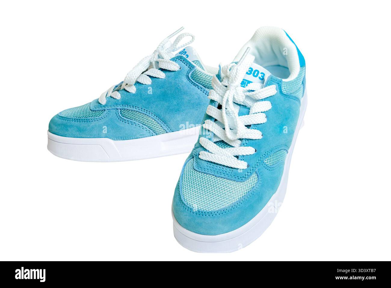 Blaue Sneakers auf weißem Isolathintergrund. Stockfoto