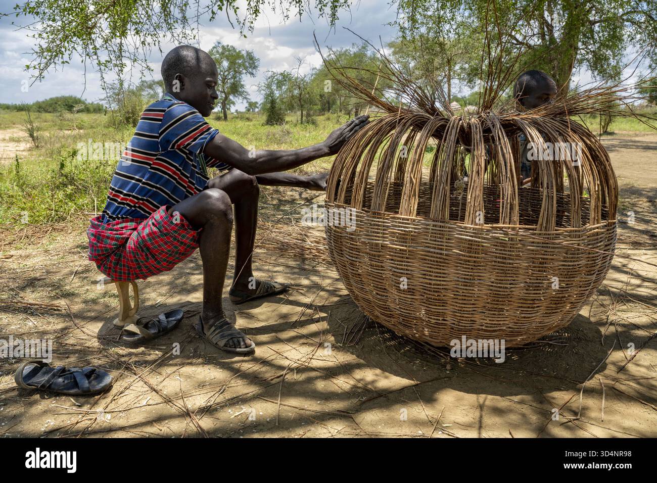 Einen Rattanfall in Loluk Village, Napak District, Karamoja, Uganda. Stockfoto