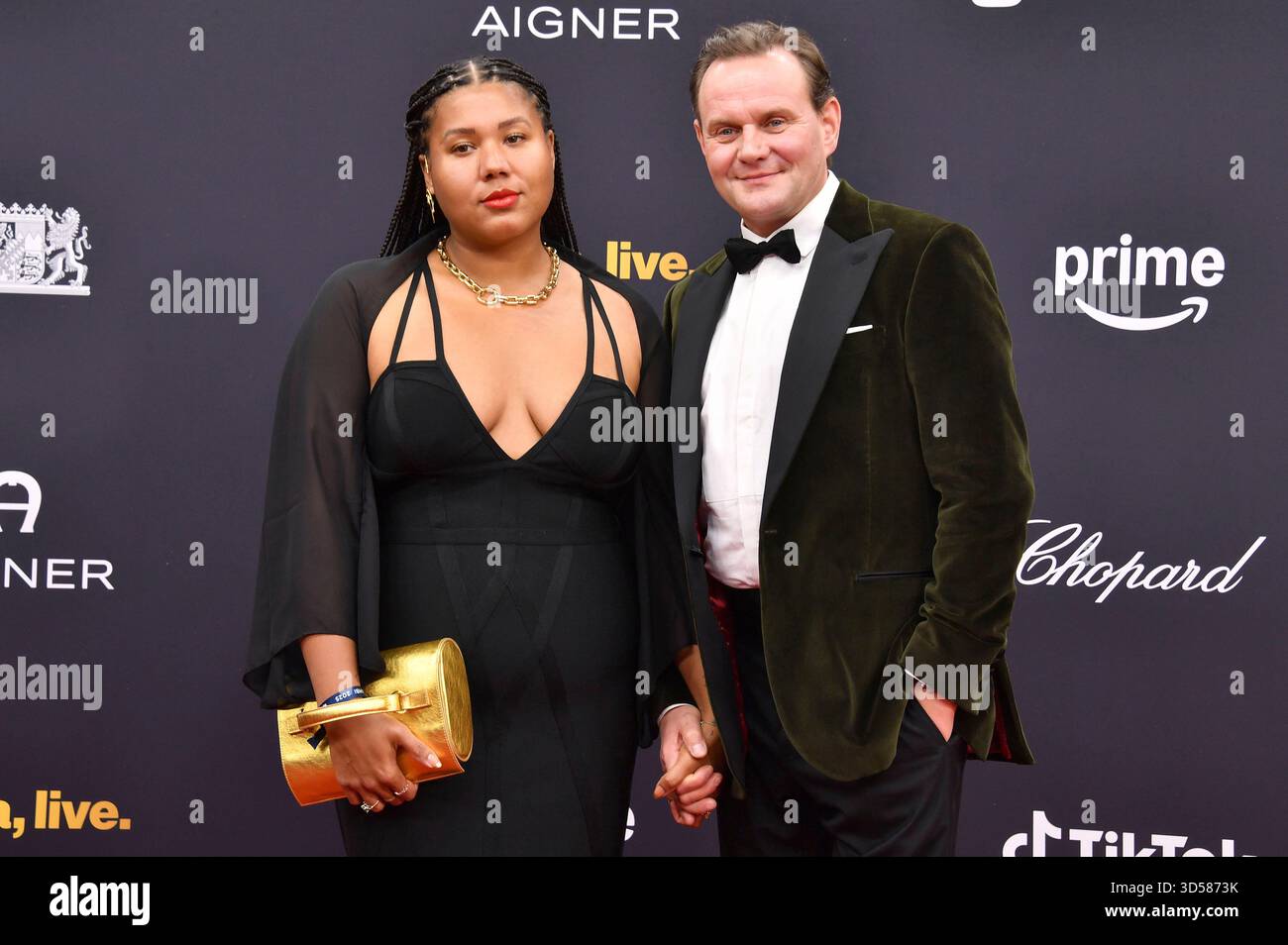 Devid Striesow mit Ehefrau Ines Ganzberger-Striesow bei der 77. Bambi-Verleihung 2025 in den Bavaria Filmstudios. München, 13.11.2025 Stockfoto