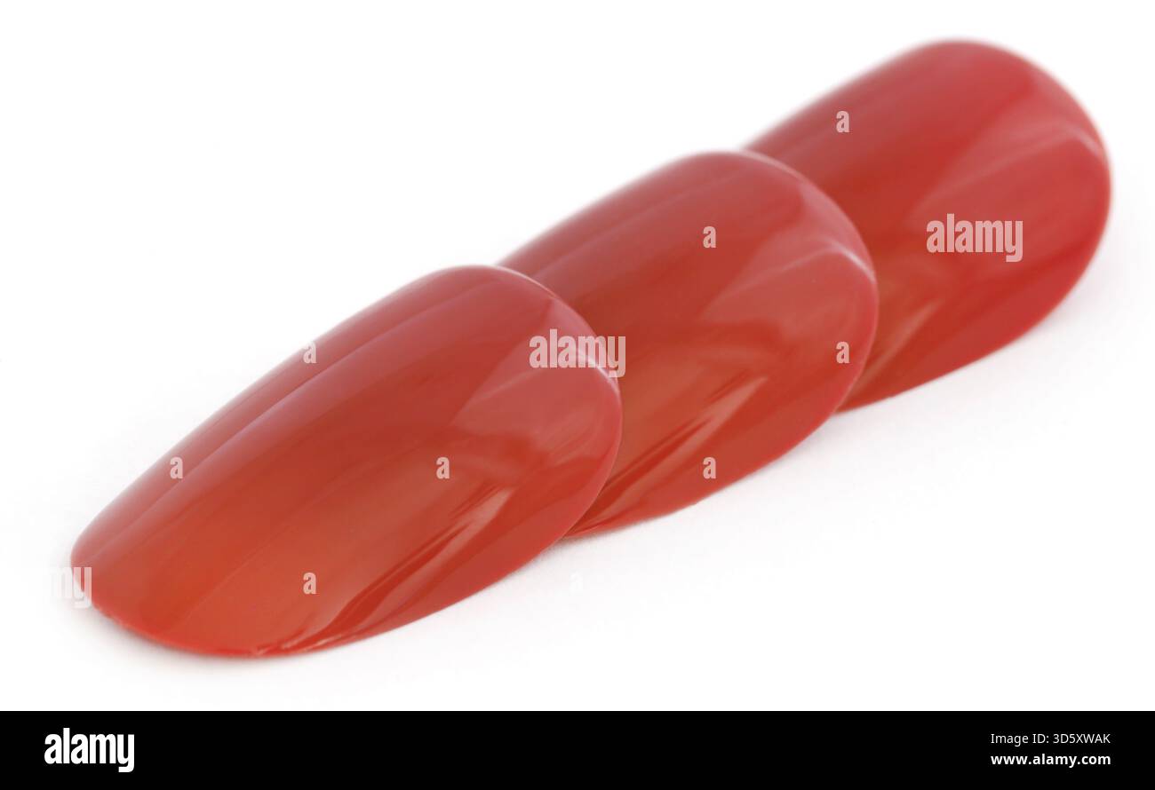 Künstliche Nägel-Nahaufnahme und isoliert Stockfoto