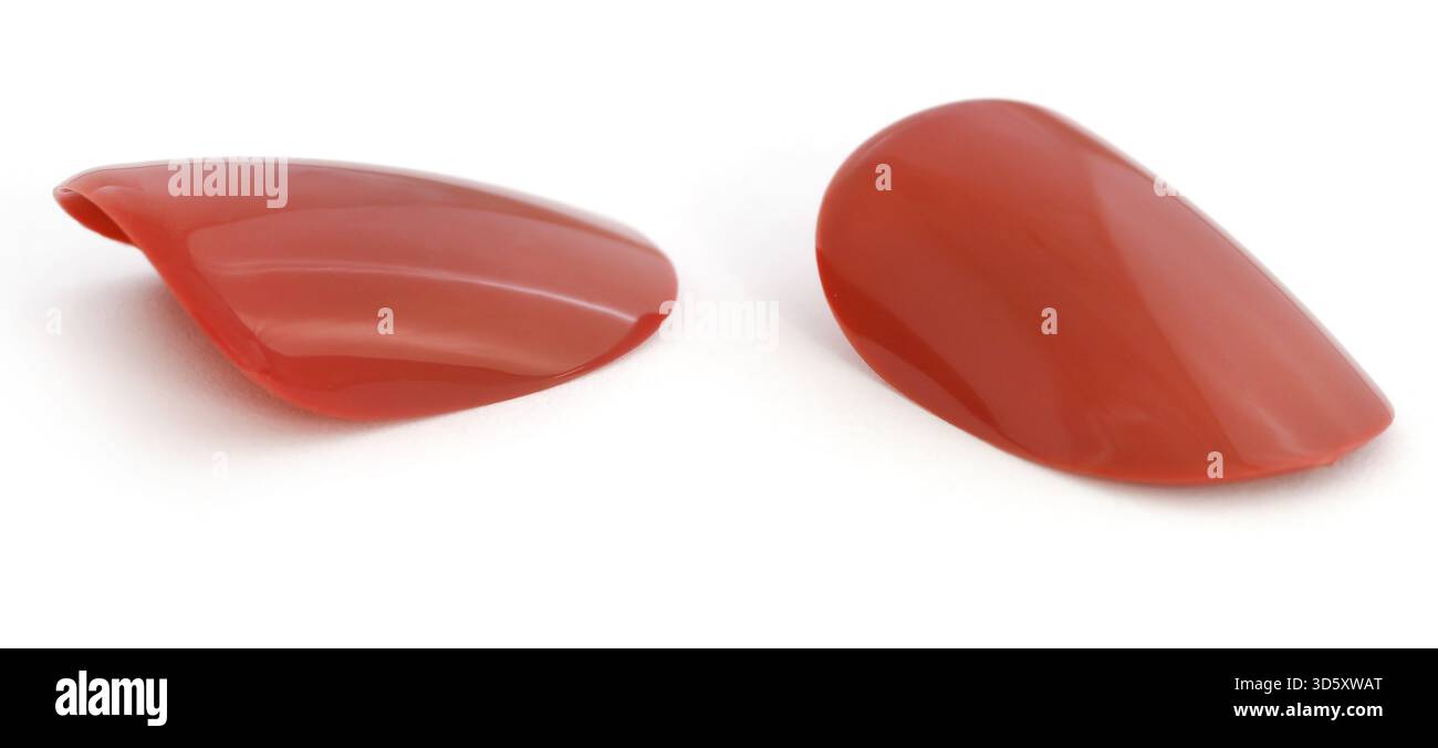 Künstliche Nägel-Nahaufnahme und isoliert Stockfoto