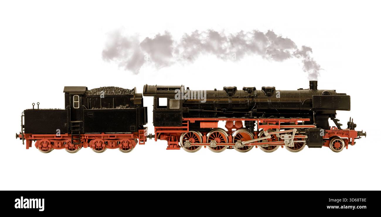 Vintage große schwarze Spielzeugzuglokomotive mit Dampf isoliert auf weißem Hintergrund Stockfoto