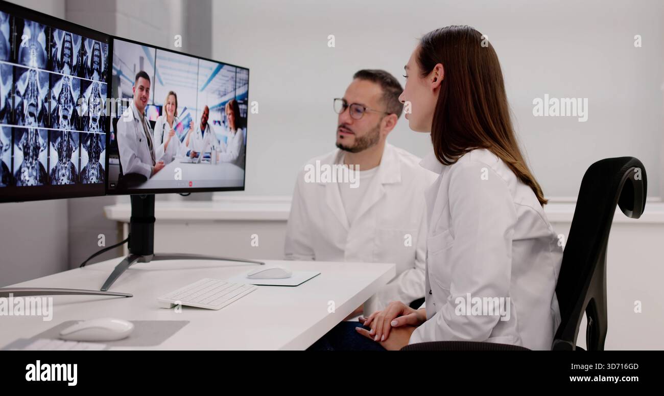 Radiologie Telehealth-Webinar: Männliche und weibliche Ärzte analysieren Röntgenstrahlen Stockfoto
