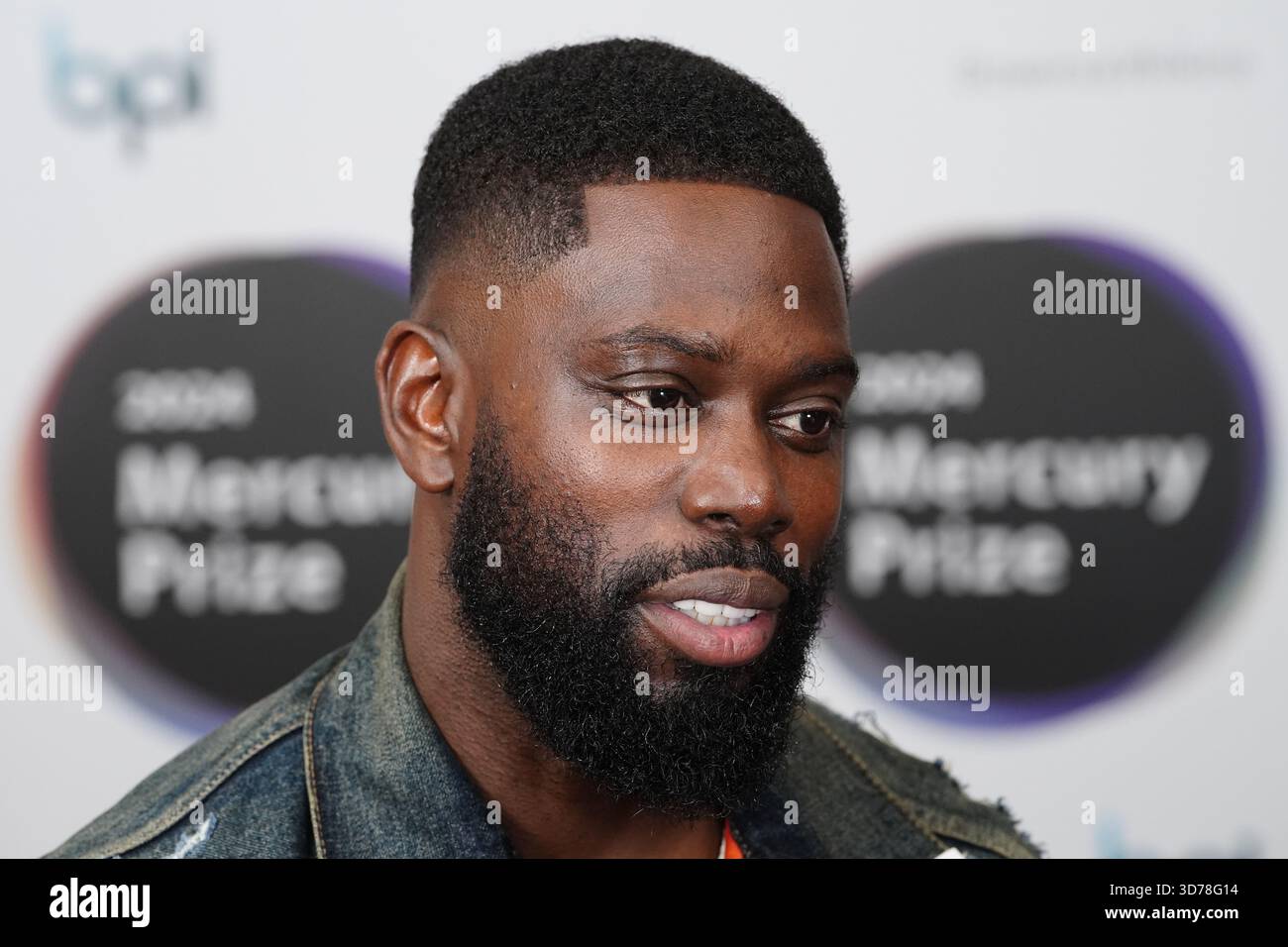 Dateifoto vom 25./07/24 des Rappers Ghetts während der Bekanntgabe der Shortlist für den Mercury Prize 'Alben des Jahres' im Langham Hotel in London. Der preisgekrönte Rapper Ghetts, dessen richtiger Name Justin Clarke-Samuel ist, wird an dem Tag, an dem er angeblich einen jungen Mann bei einer Kollision tötete, wegen gefährlichem Fahrens angeklagt. Der düstere Künstler konnte angeblich nicht aufhören, nachdem sein BMW den 20-jährigen Yubin Tamang im Nordosten Londons getroffen hatte. Am Montag trat Clarke-Samuel im Old Bailey auf, indem er ein graues Kurzarm-T-Shirt trug. Ausstellungsdatum Stockfoto