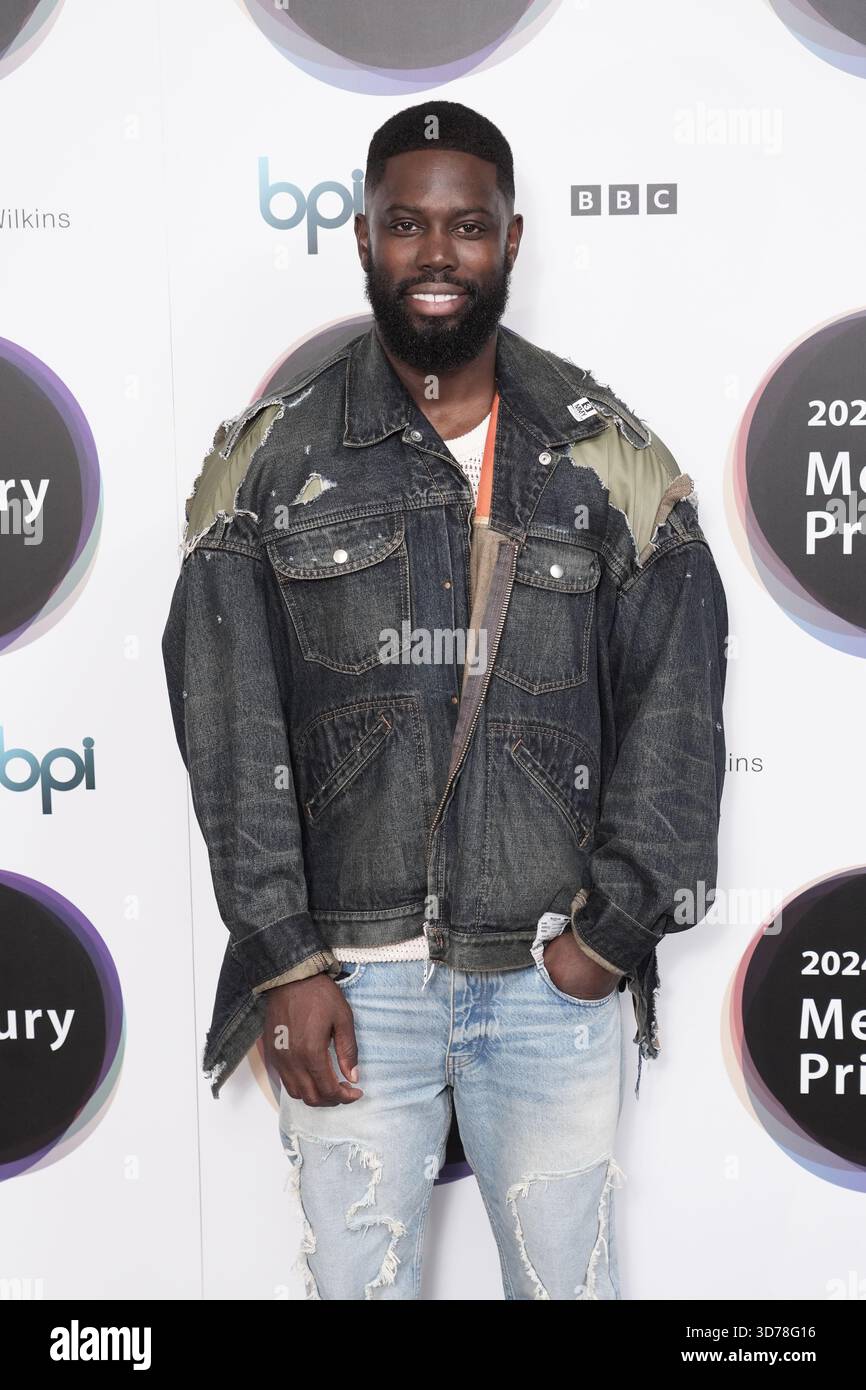 Dateifoto vom 25./07/24 des Rappers Ghetts während der Bekanntgabe der Shortlist für den Mercury Prize 'Alben des Jahres' im Langham Hotel in London. Der preisgekrönte Rapper Ghetts, dessen richtiger Name Justin Clarke-Samuel ist, wird an dem Tag, an dem er angeblich einen jungen Mann bei einer Kollision tötete, wegen gefährlichem Fahrens angeklagt. Der düstere Künstler konnte angeblich nicht aufhören, nachdem sein BMW den 20-jährigen Yubin Tamang im Nordosten Londons getroffen hatte. Am Montag trat Clarke-Samuel im Old Bailey auf, indem er ein graues Kurzarm-T-Shirt trug. Ausstellungsdatum Stockfoto