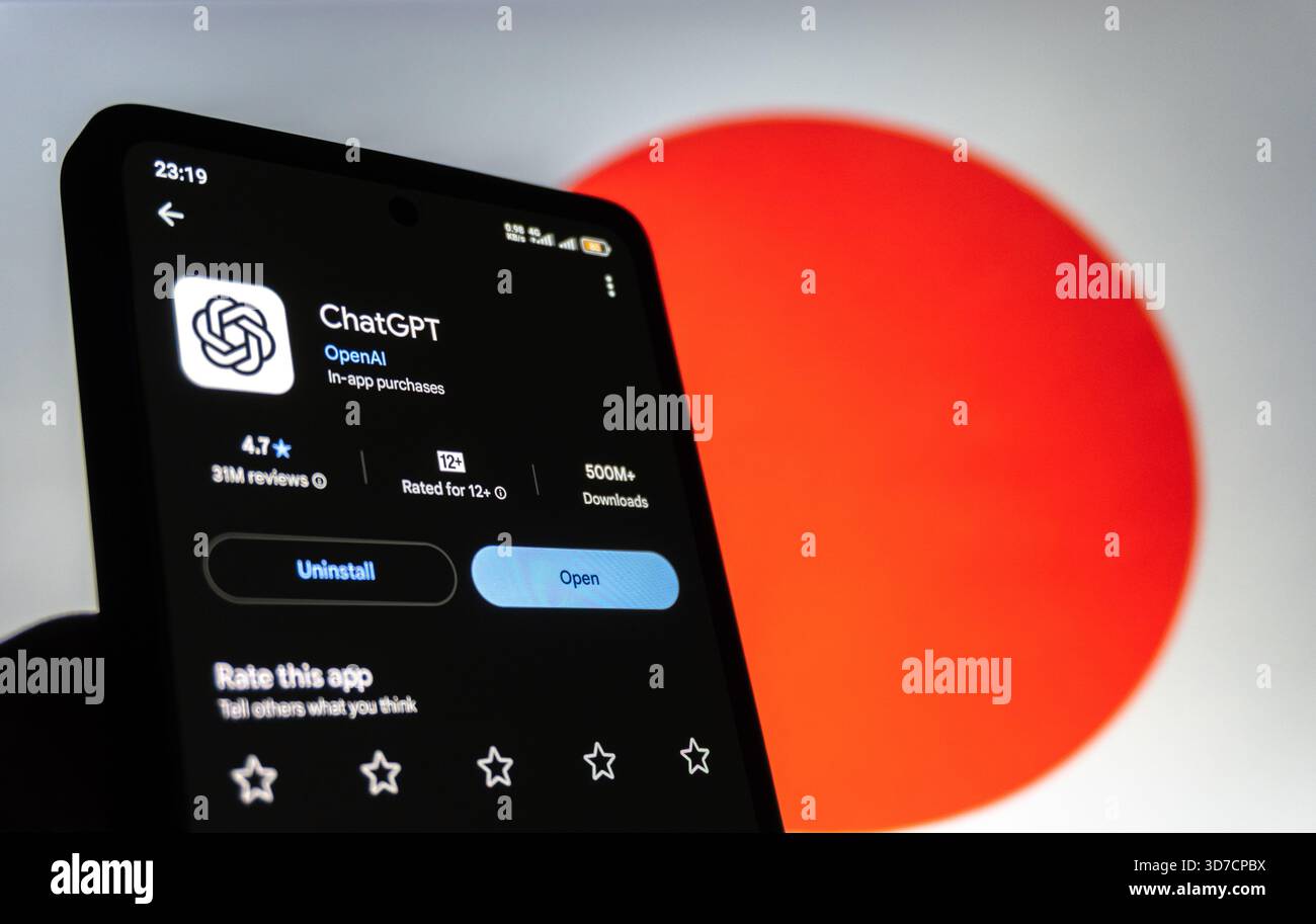ChatGPT-App auf dem Smartphone vor der Flagge Japans. Baku, Aserbaidschan. 11.25.2025. Stockfoto