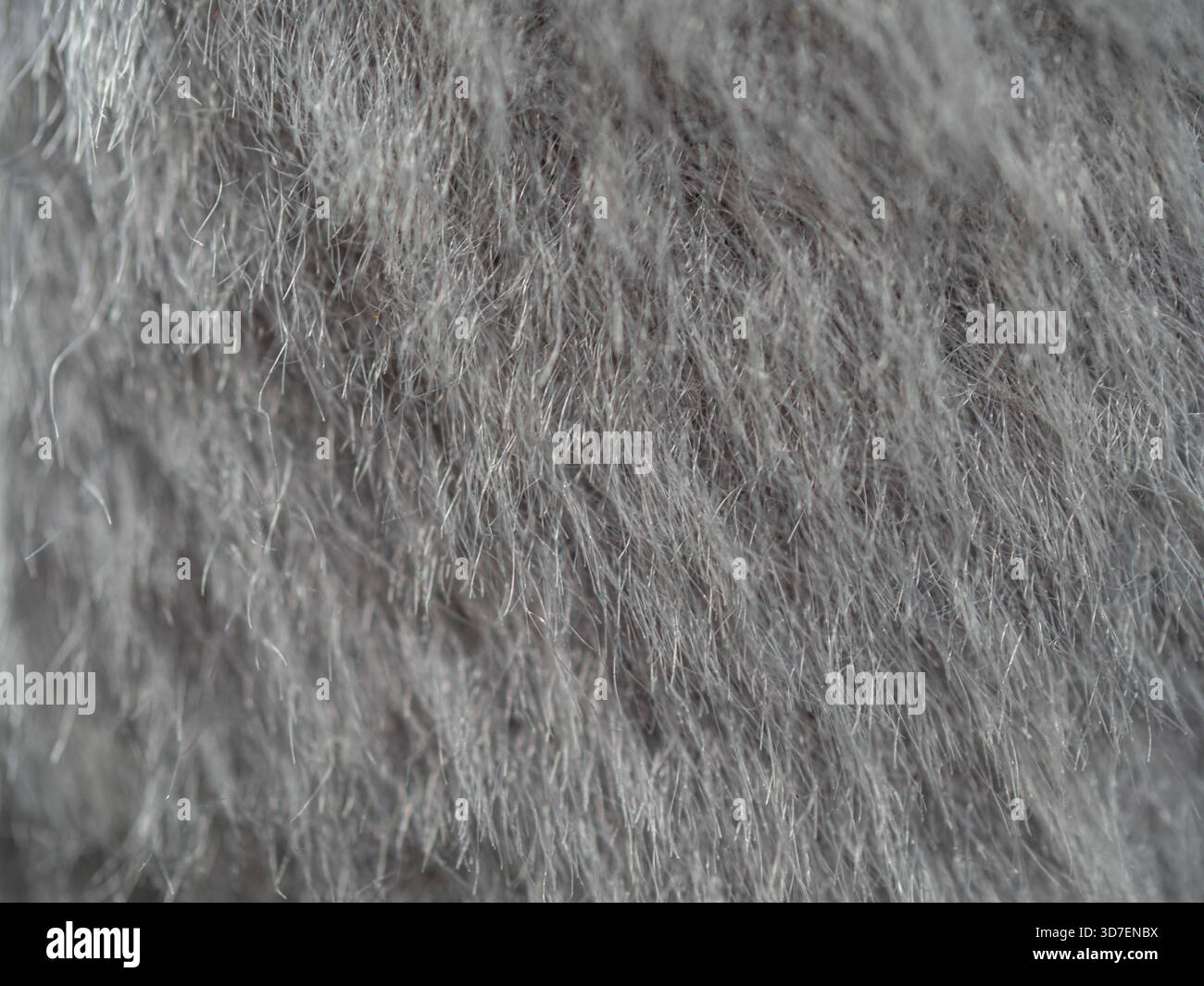 Nahaufnahme Textur aus synthetischer Faser auf dem Bodenteppich Stockfoto