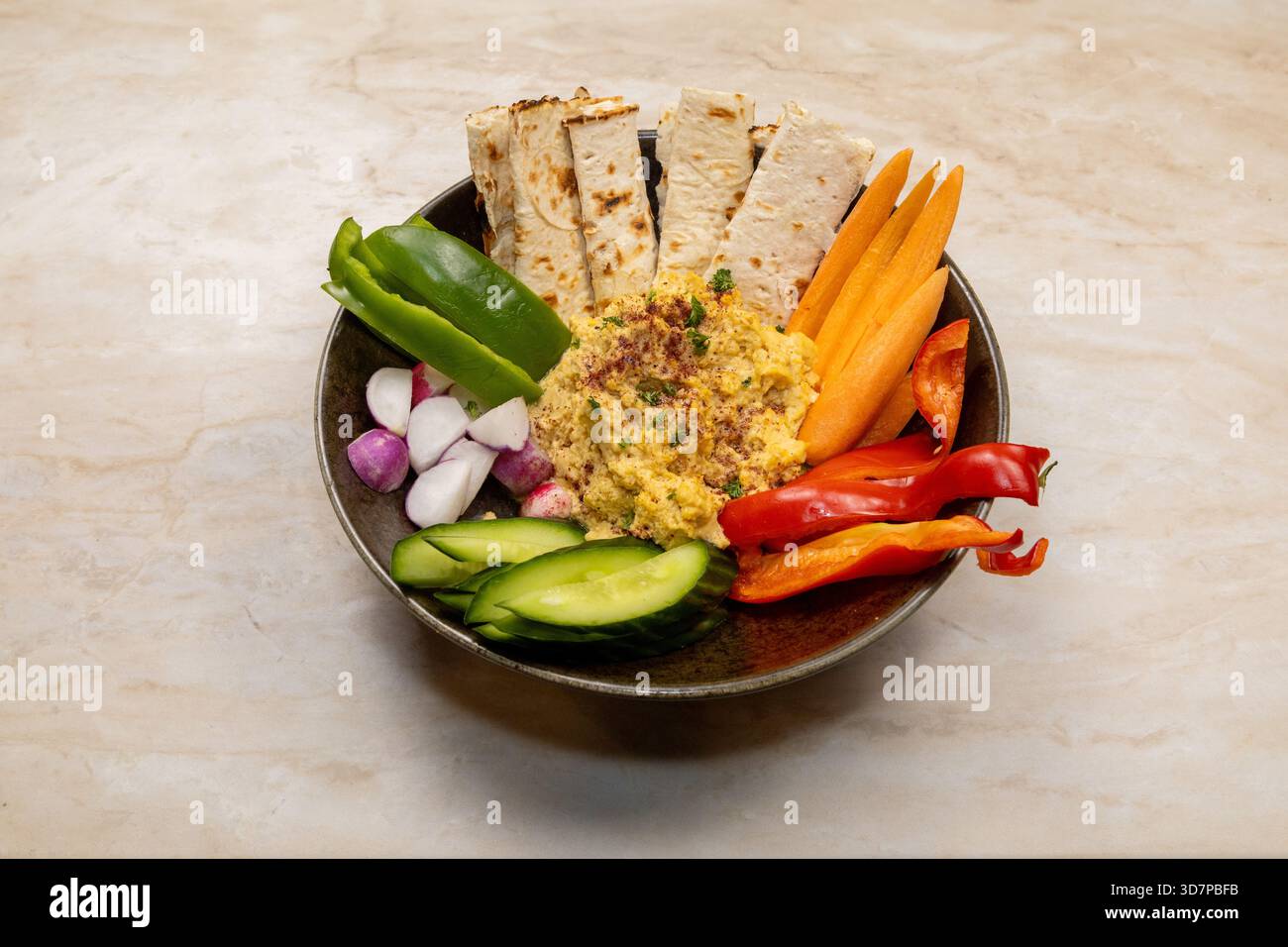 Hummus-Platte Stockfoto