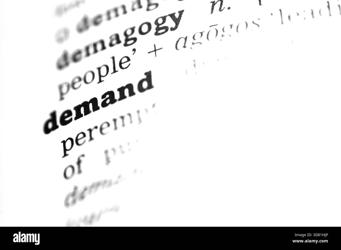 Fordern Sie Wörterbuch Definition Einzelwort mit soft focus Stockfoto