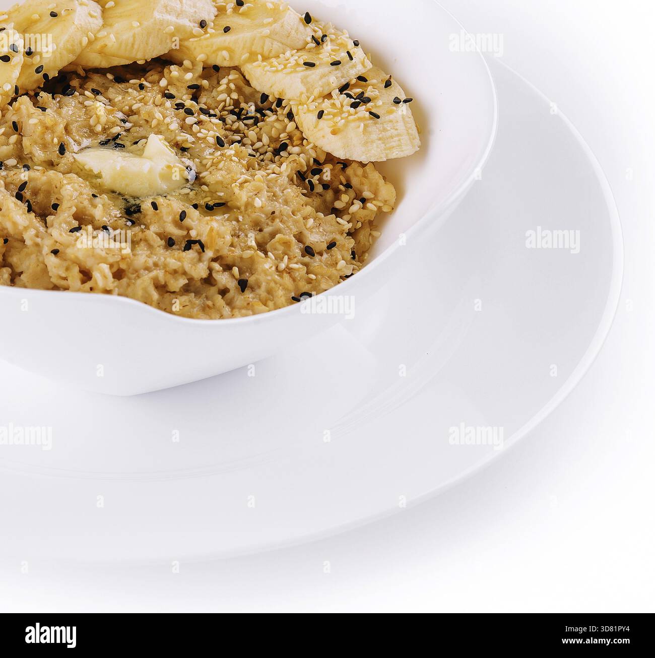 Essen, Schüssel Haferbrei mit Banane Stockfoto