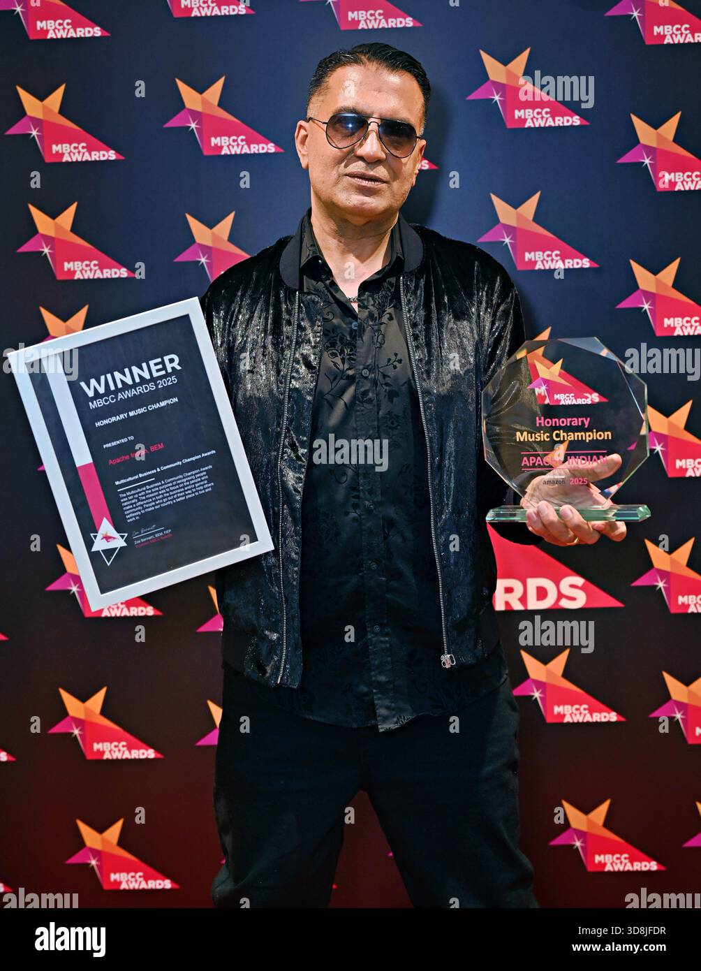 Birmingham, Großbritannien. November 2025. Apache Indian Gewinner Honorary Music Champion bei den Awards of the Multikultural Business & Community Champion Awards 2025 (MBCC Awards) im Hilton Birmingham Metropole, Birmingham, Großbritannien. (Foto von 李世惠/siehe Li/Picture Capital) Credit: Siehe Li/Picture Capital/Alamy Live News Stockfoto