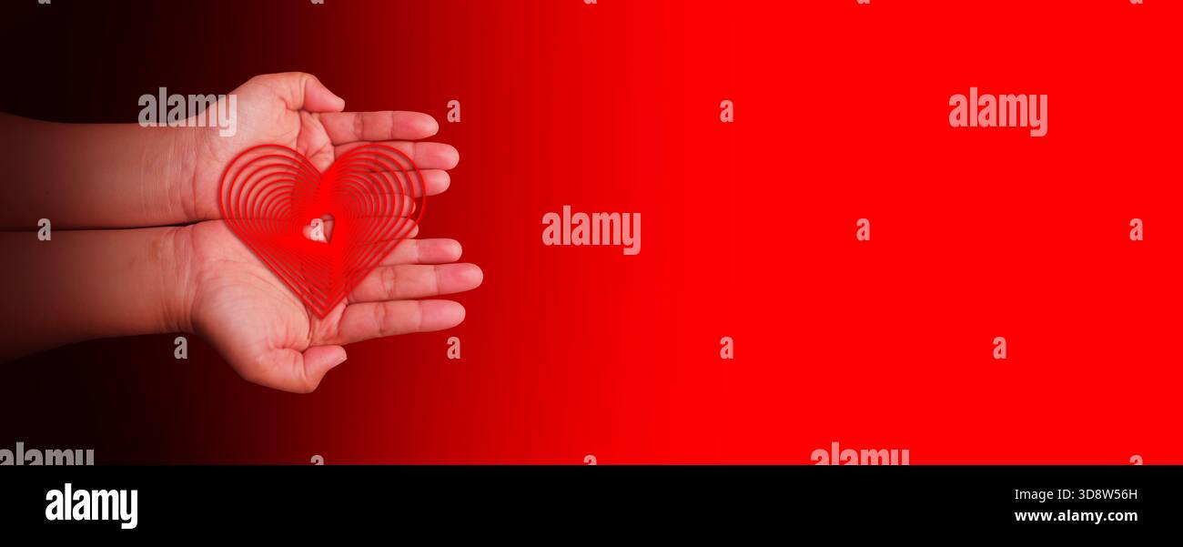 Hände mit einem roten Herzsymbol, die Gesundheit, Liebe, Wohlbefinden, Dankbarkeit, Hoffnung, Familienschutz, Organspende, Versicherung, CSR, Welt Stockfoto
