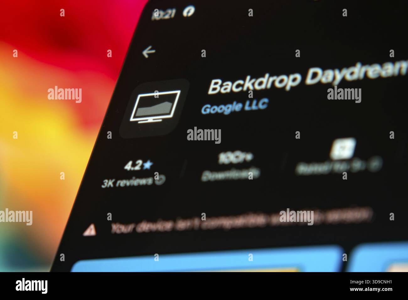 Backdrop Daydream App-Oberfläche von Google LLC auf einem Mobilgerät mit farbenfrohem Hintergrund angezeigt Stockfoto