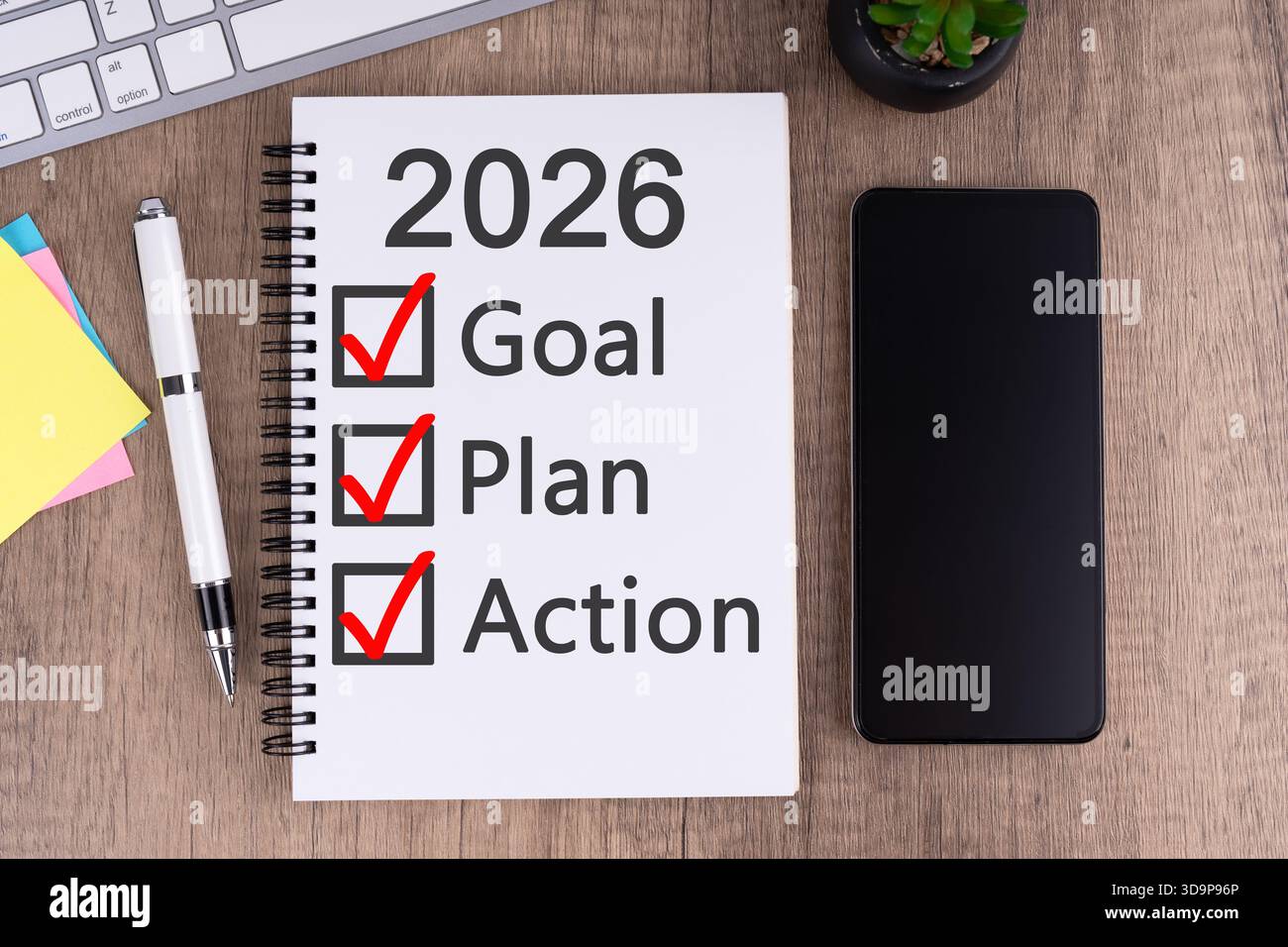 2026 Ziel, Plan und Aktion für Notizblock Neujahrskonzept Stockfoto