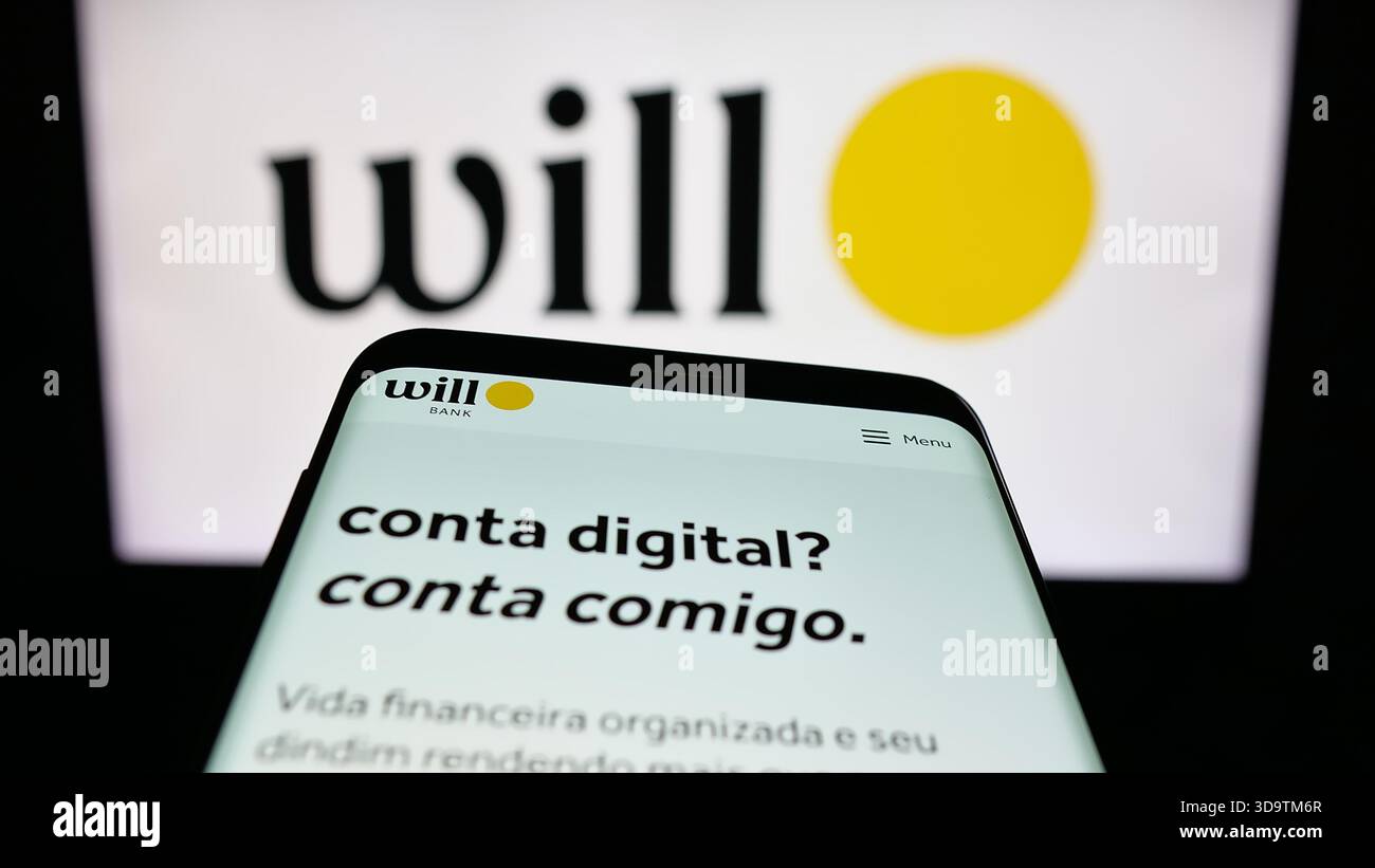 Stuttgart, Deutschland - 28.11.2025: Mobiltelefon mit Website der brasilianischen Bank will Financeira S.A. auf dem Bildschirm vor dem Logo. Stockfoto