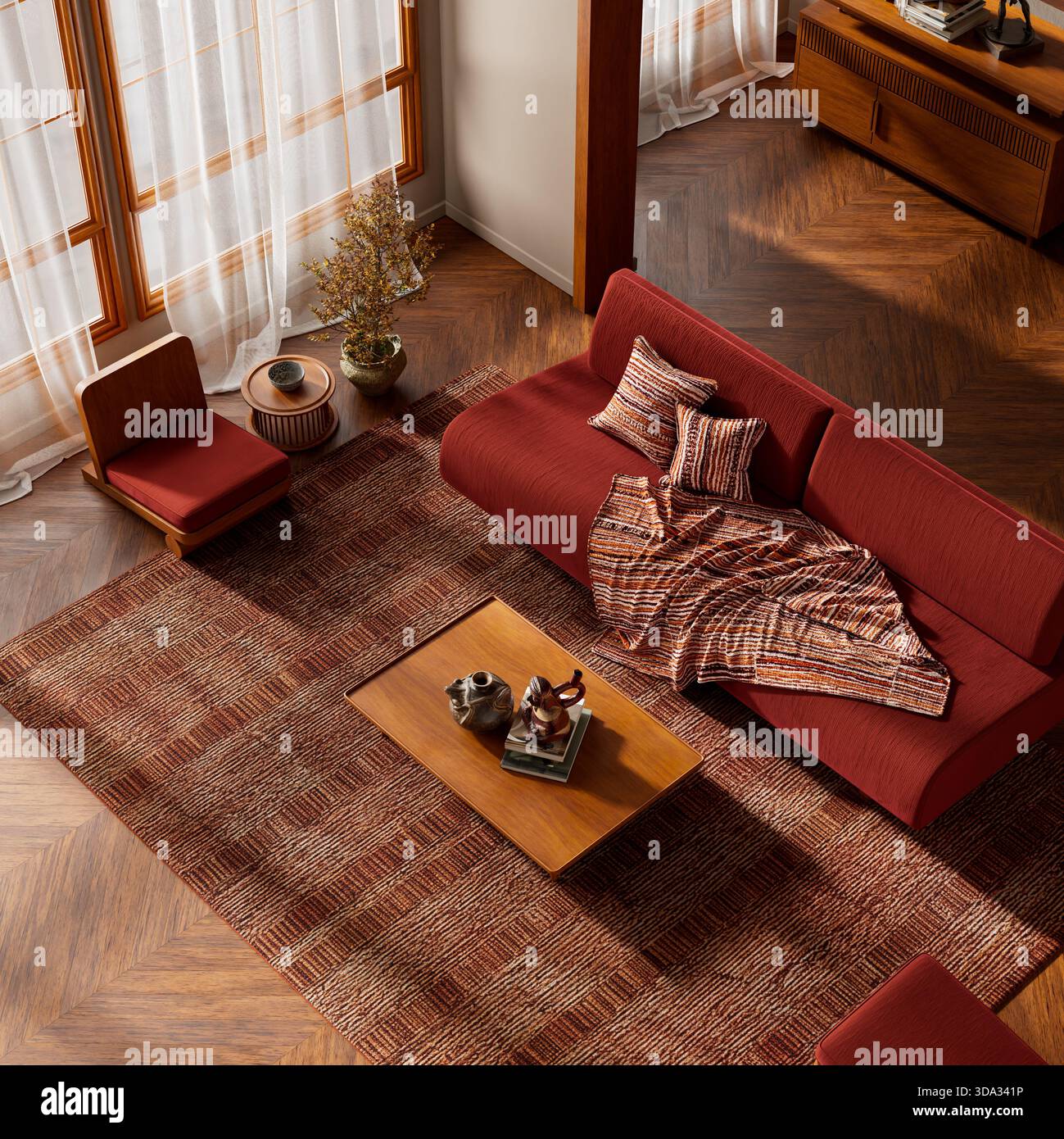 Eine kuratierte Szene von oben, die warmes Licht, organische Materialien und raffinierte minimalistische Formen kombiniert und eine ruhige, zusammenhängende und visuell strukturierte Moderne bietet Stockfoto