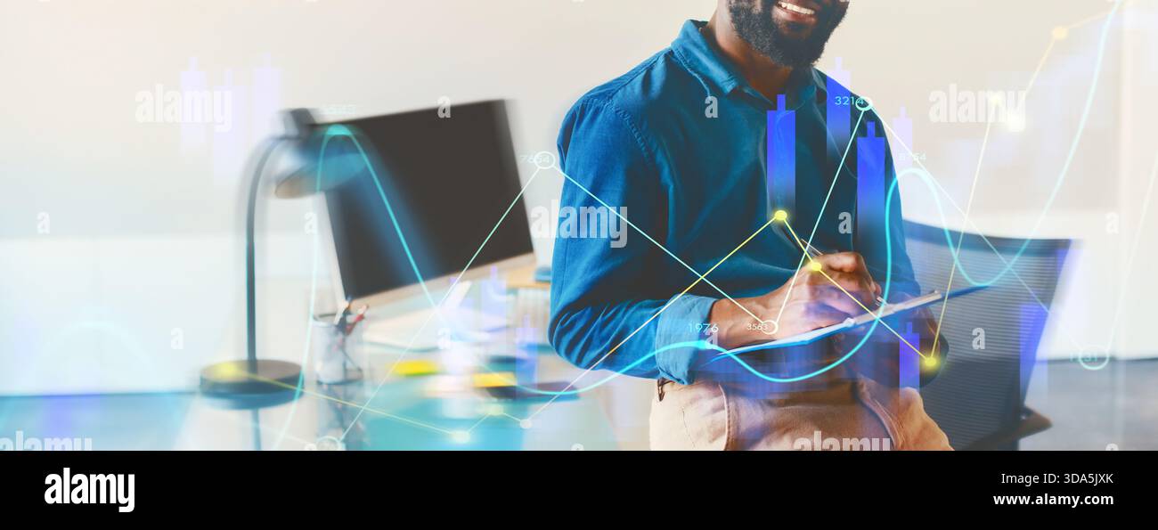 Geschäftsmann erstellt Grafiken und Datenvisualisierungen in einer modernen Büroumgebung Stockfoto