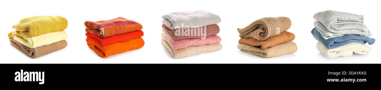 Set warmer Strickpullover auf weißem Hintergrund Stockfoto