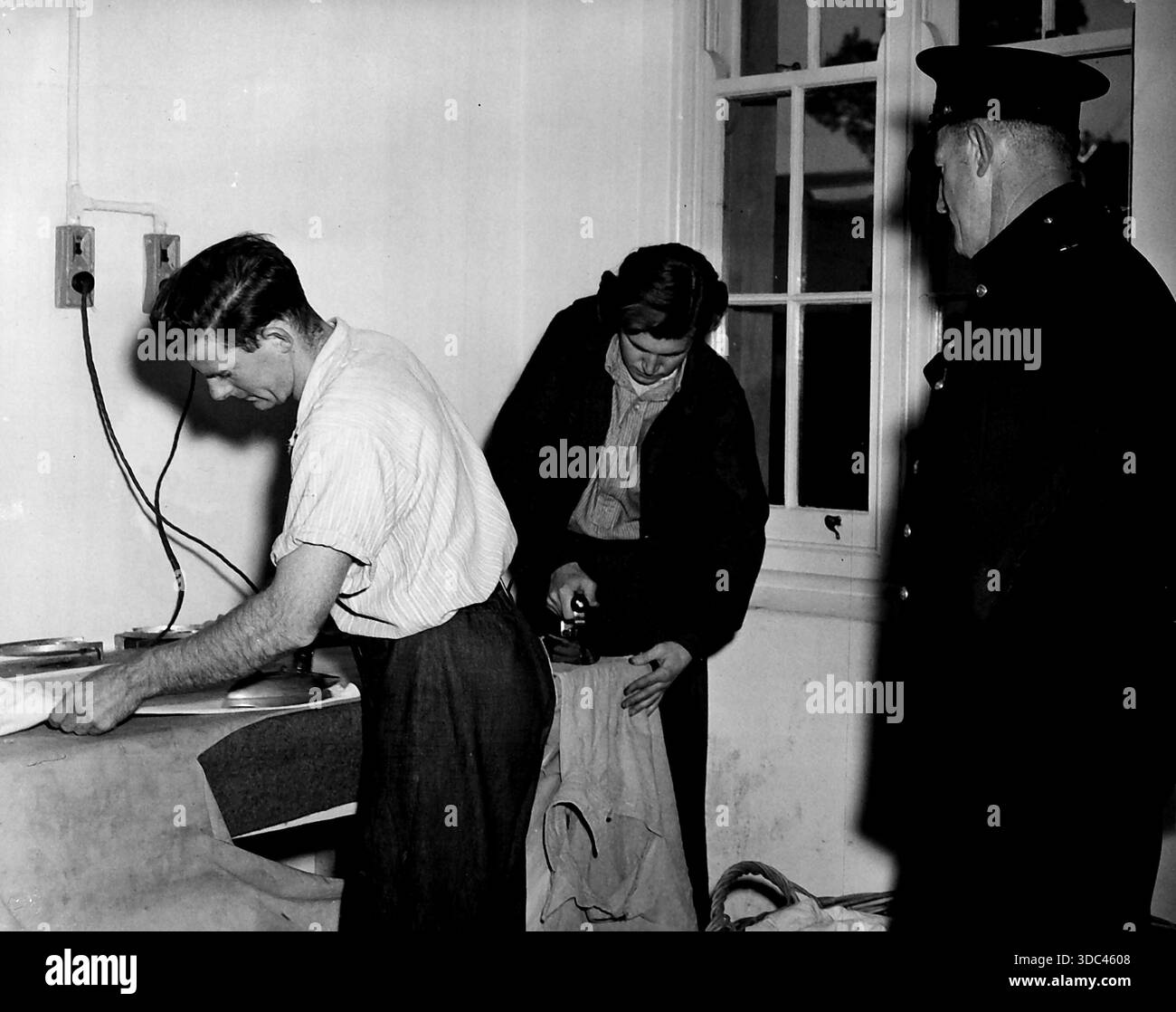 Das Gefängnis verfügt über eine moderne Dampfwäsche, und jeder Mann bekommt täglich eine saubere Unterwäsche. Sie bügeln ihre eigenen Hemden und Shorts unter bestem Zustand Stockfoto