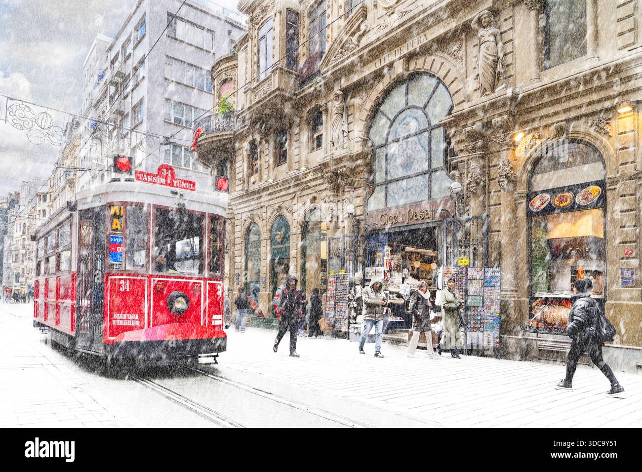 Blick über die Istiklal-Straße mit rotem Straßenwagen, im Schnee im Viertel Beyoglu, Istanbul, Türkei Stockfoto