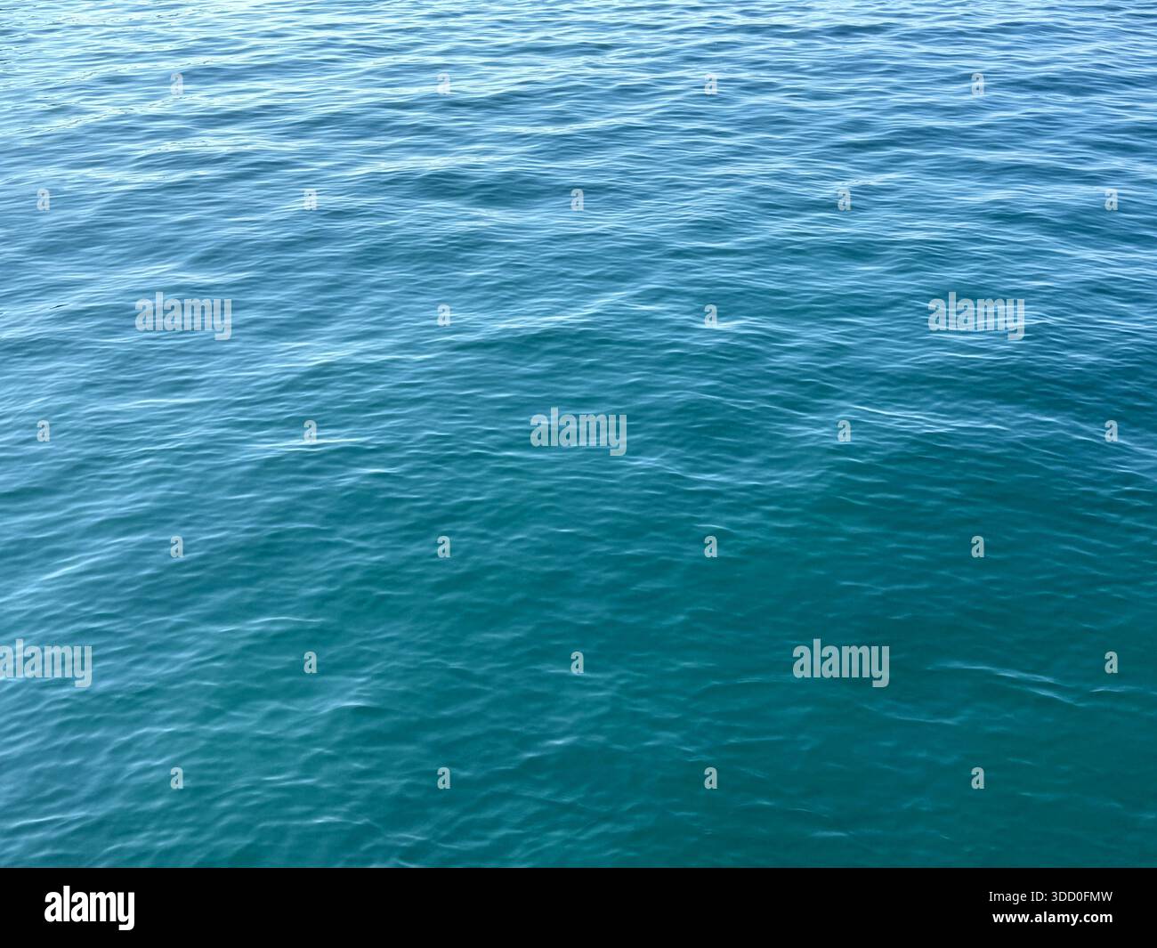 Blaues Wasser wellige Oberfläche Aqua Hintergrund Stockfoto