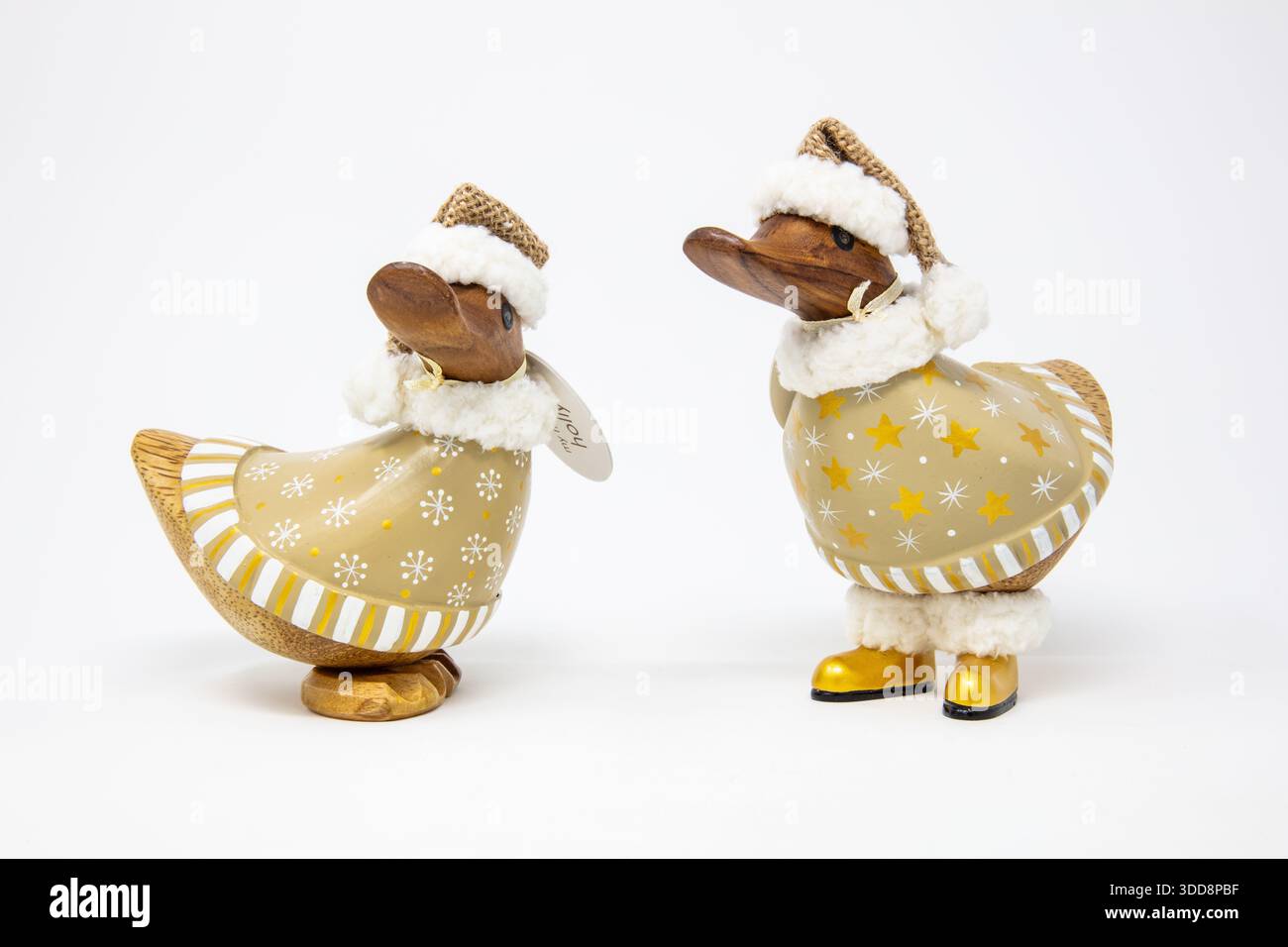Original Wooden Duck Company - Vergoldeter Karamell Ducky Star/Snowflke. Stockfoto