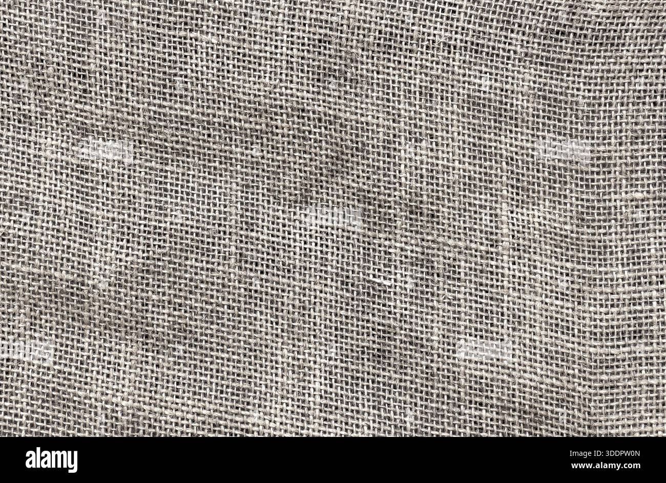 Die Sackleinen-Struktur bildet ein gewebtes Muster für einen organischen Textil-Hintergrund Stockfoto