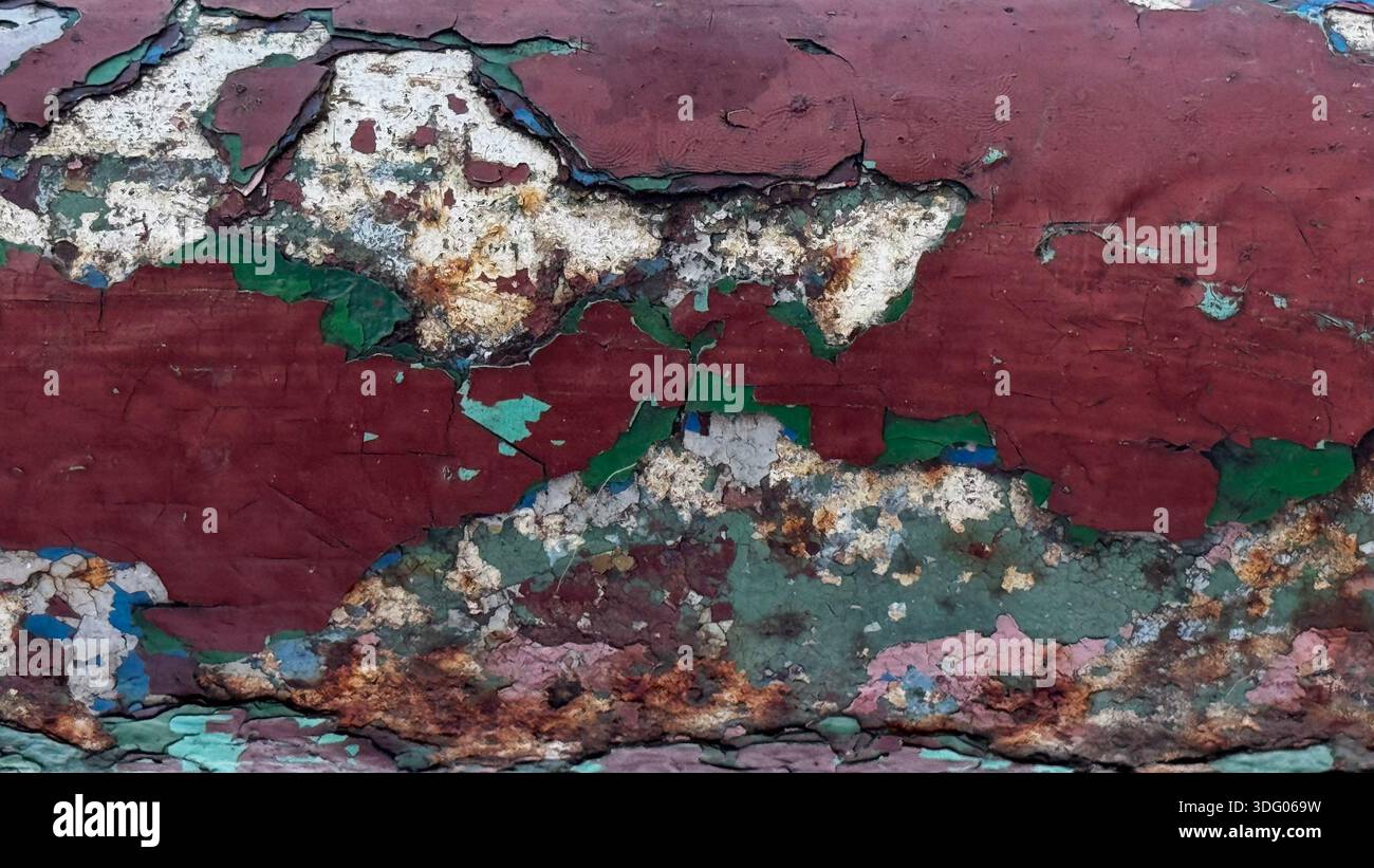 Strukturierte Nahaufnahme von verwitterter Farbe auf Metalloberfläche Stockfoto