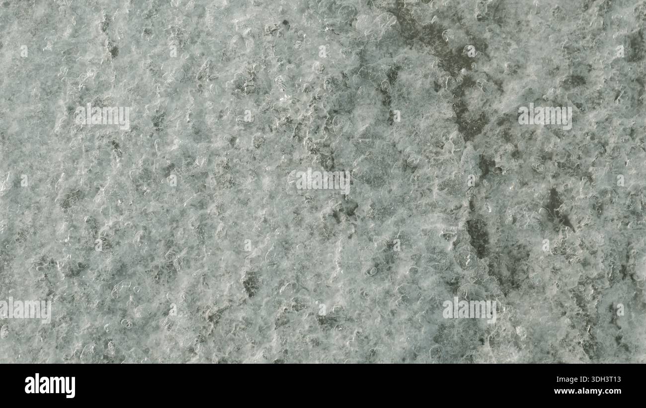 Frozen Ice Texture auf dem Boden bei extremer Winterkälte Stockfoto