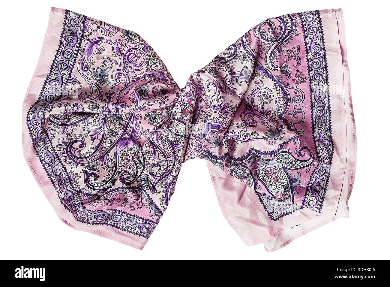 Gebundenes elegantes pastellrosa Seidentuch isoliert auf weißem Hintergrund Stockfoto