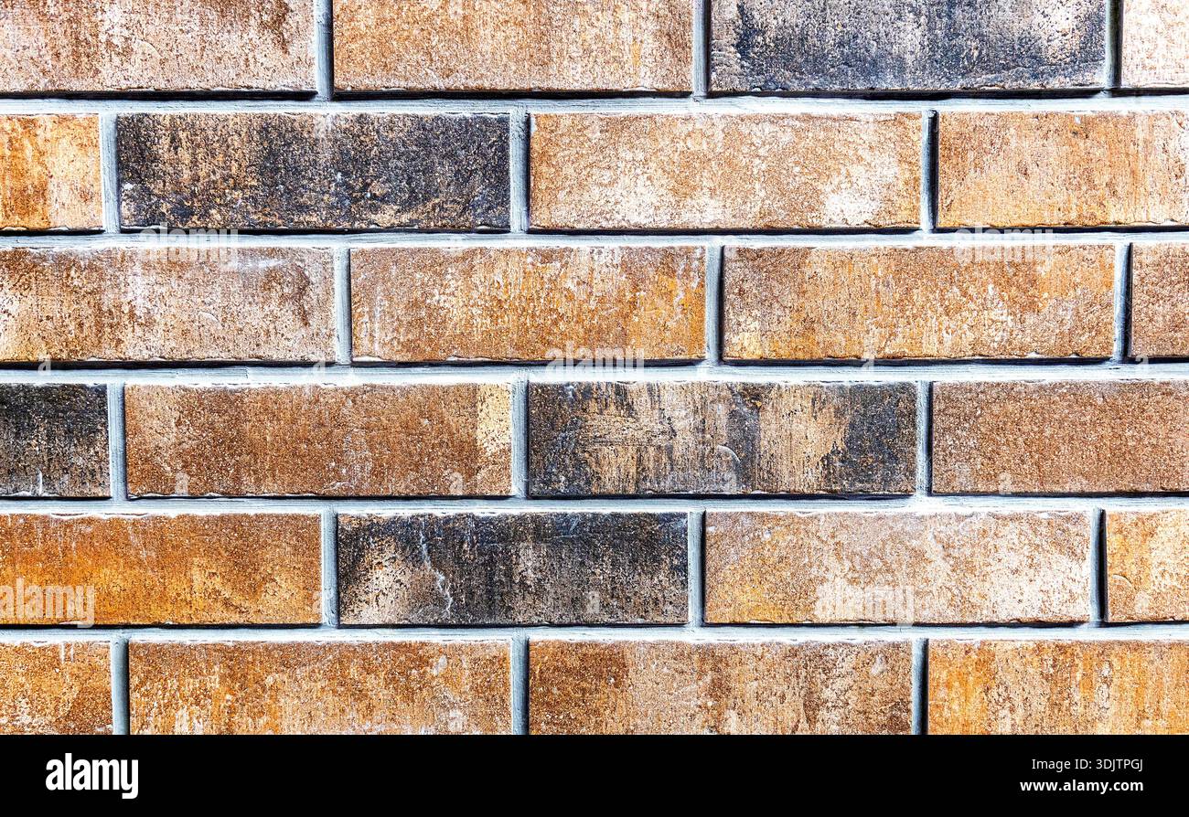 Ziegelwand als kreative Hintergrundstruktur aus nächster Nähe Stockfoto