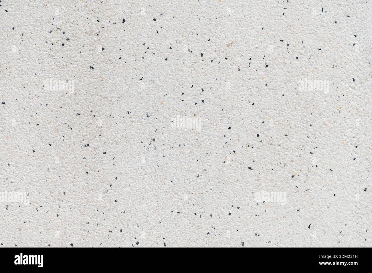 Weißer Terrazzo-Stein Textur Hintergrund mit kleinen Kieseldetails Stockfoto