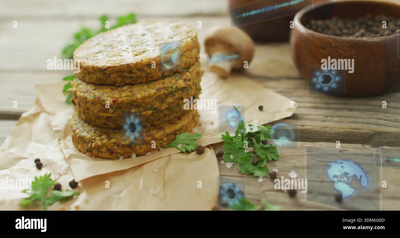 Sitzende vegetarische Patties auf Pergament auf Holzplanke, mit Kräutern, Schüsseln, Schaufel, holografischer Oberfläche Stockfoto