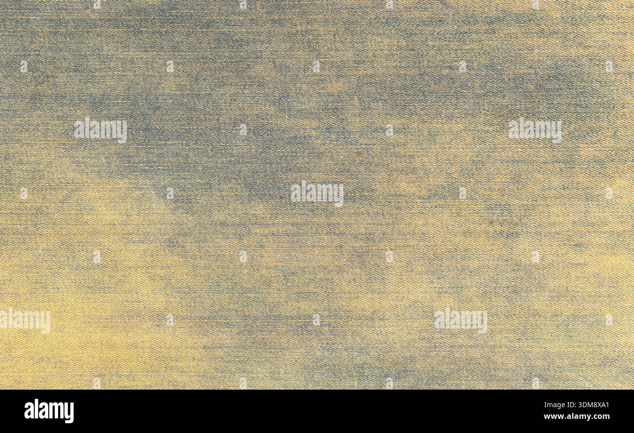Gewaschenes Denim-Material mit strukturiertem blau-gelbem Webmuster für den Hintergrund Stockfoto