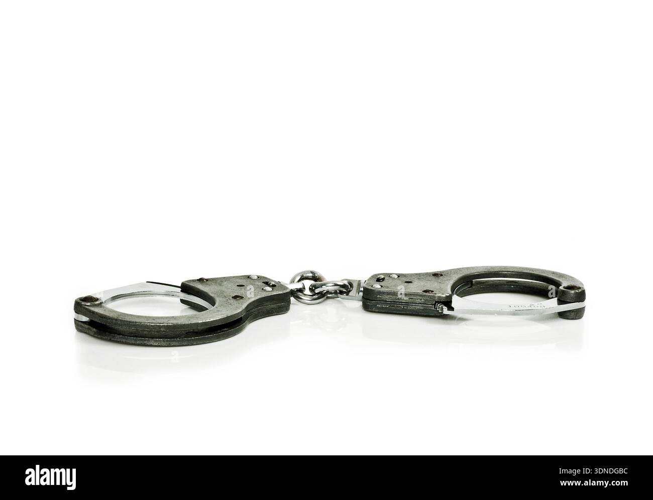 Verriegelte Handschellen Stockfoto