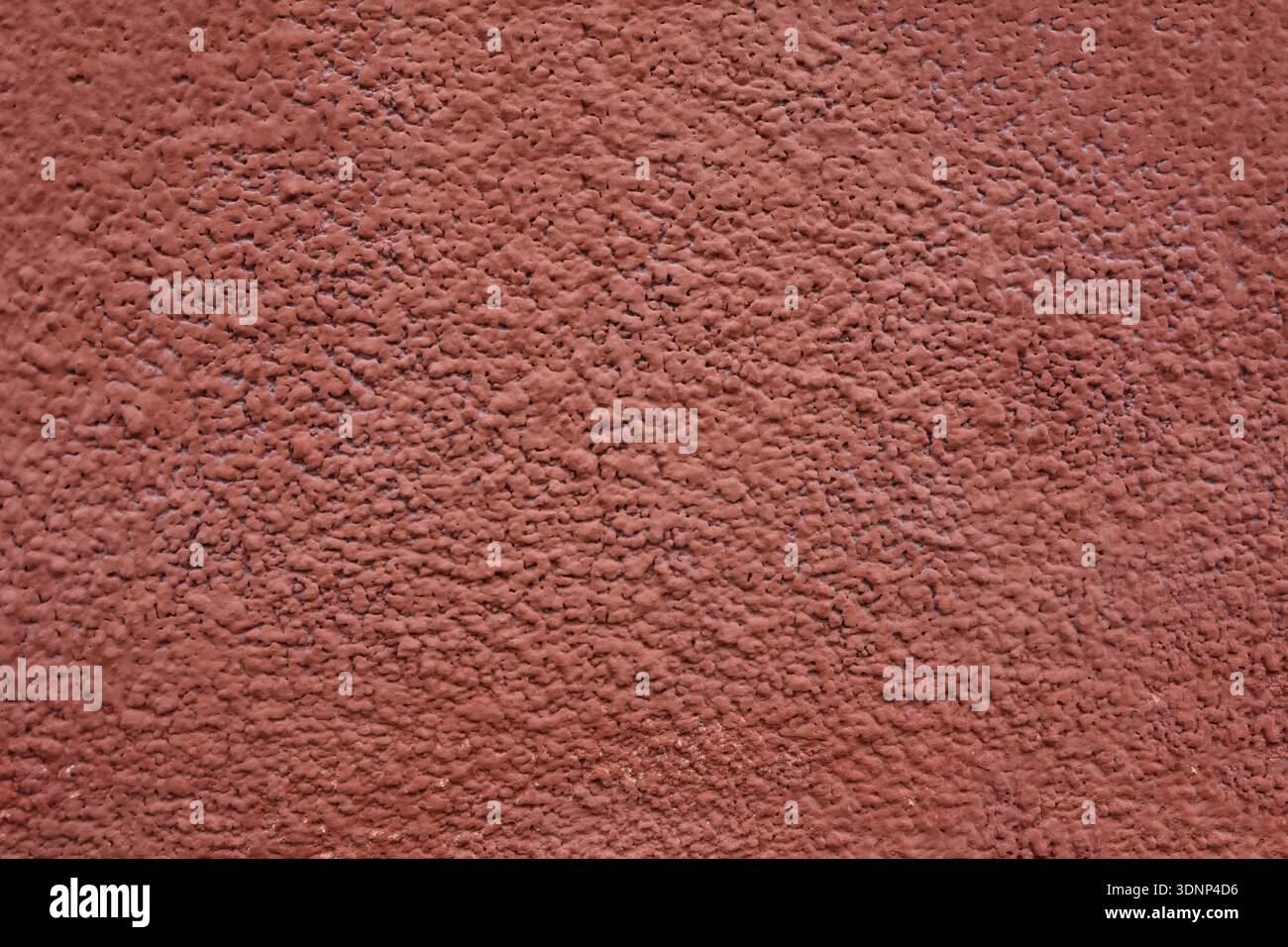 Verputzte Wand mit feiner Textur. Wandstruktur, Betonputz, feiner grungy Hintergrund. Nahaufnahme. Goldener Texturhintergrund. Fein strukturiert alt Stockfoto