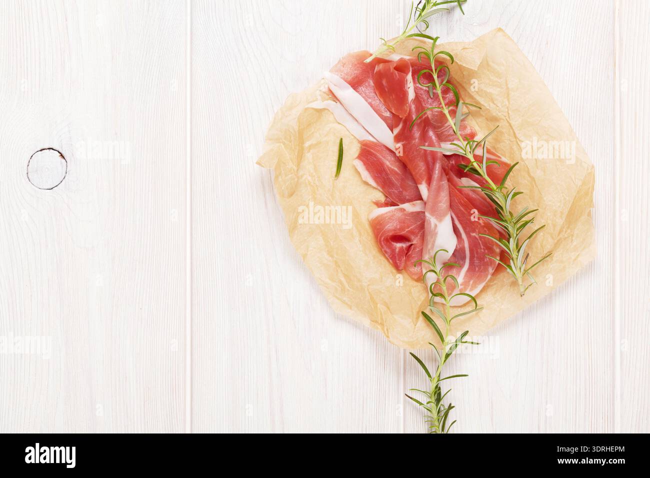 Prosciutto mit Rosmarin Stockfoto