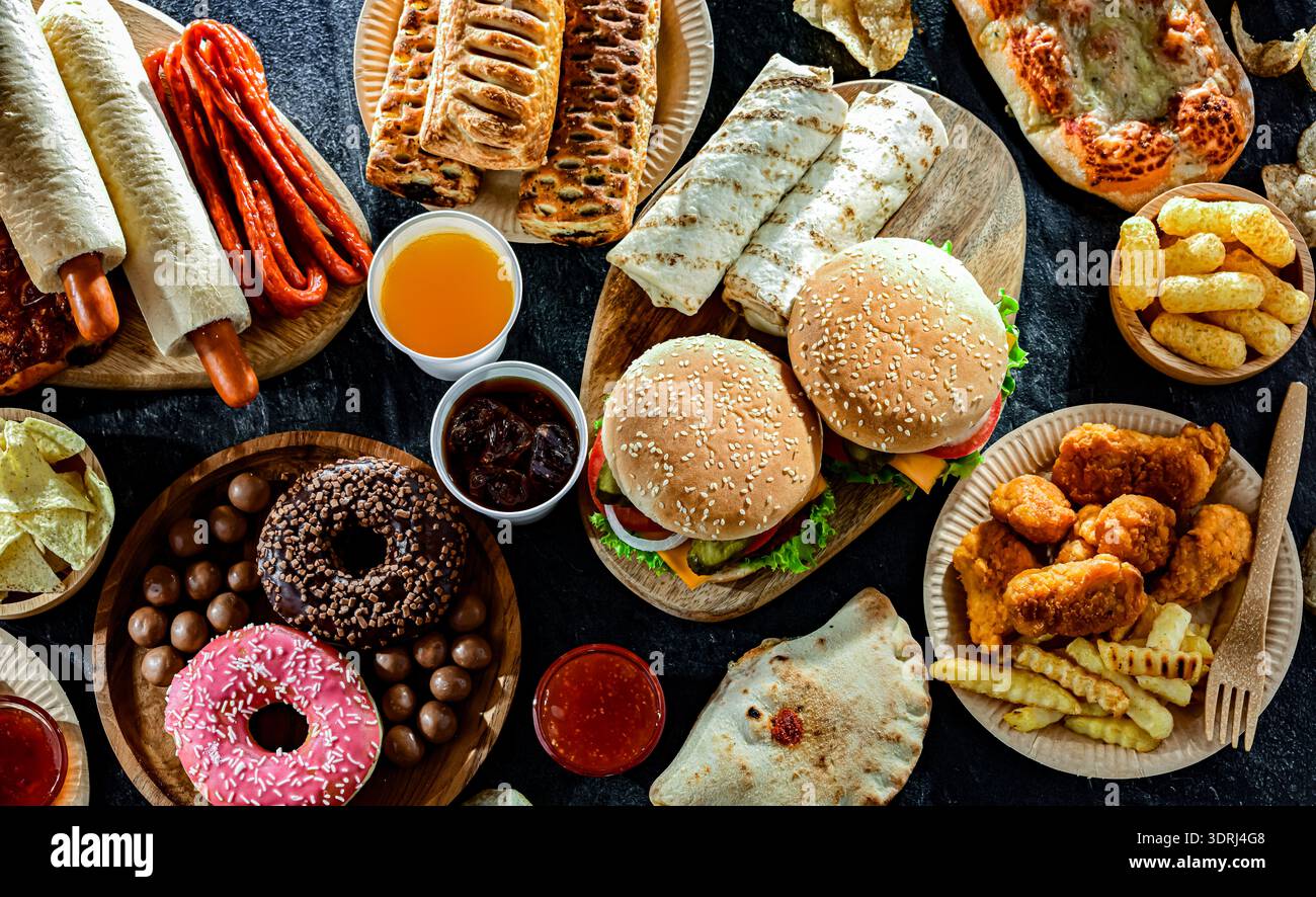 Lebensmittel, die das Krebsrisiko erhöhen. Junk Food Stockfoto