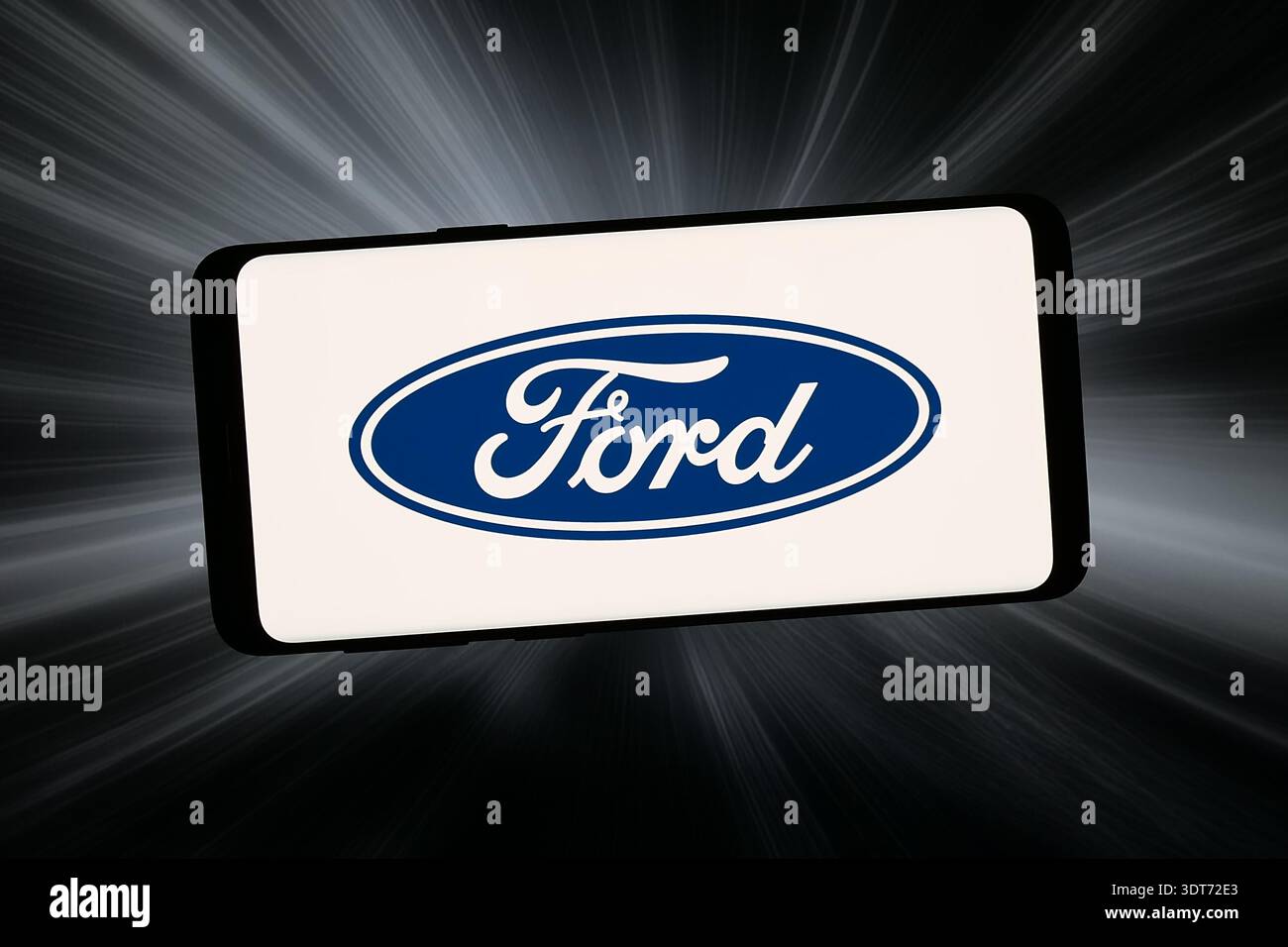 Stuttgart, Deutschland - 02.12.2026: In dieser Fotoabbildung ist das Logo des US-amerikanischen Automobilunternehmens Ford Motor Company auf einem Smartphone zu sehen Stockfoto