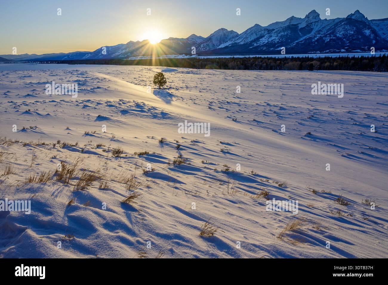 USA, Rocky Mountains, Wyoming, Grand Teton, Nationalpark Sonnenuntergang im Winter Stockfoto