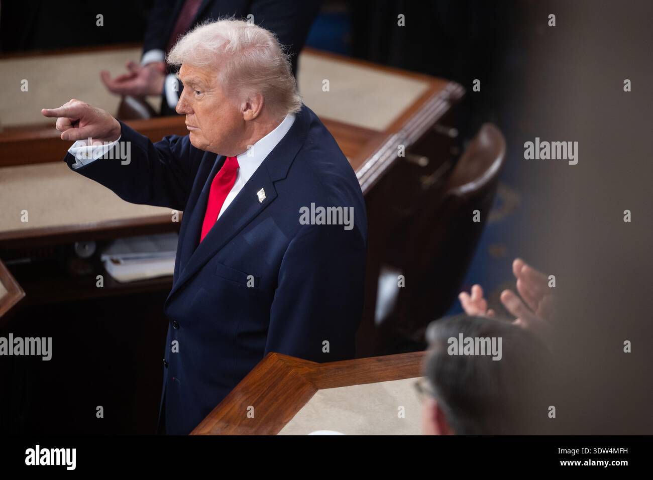 President Donald Trump reacts as he prepares to depart after delivering his State of the Union address in the House chamber at the U.S. Capitol in Washington, on Feb. 24, 2026. (Francis Chung/POLITICO via AP Images) Stockfoto