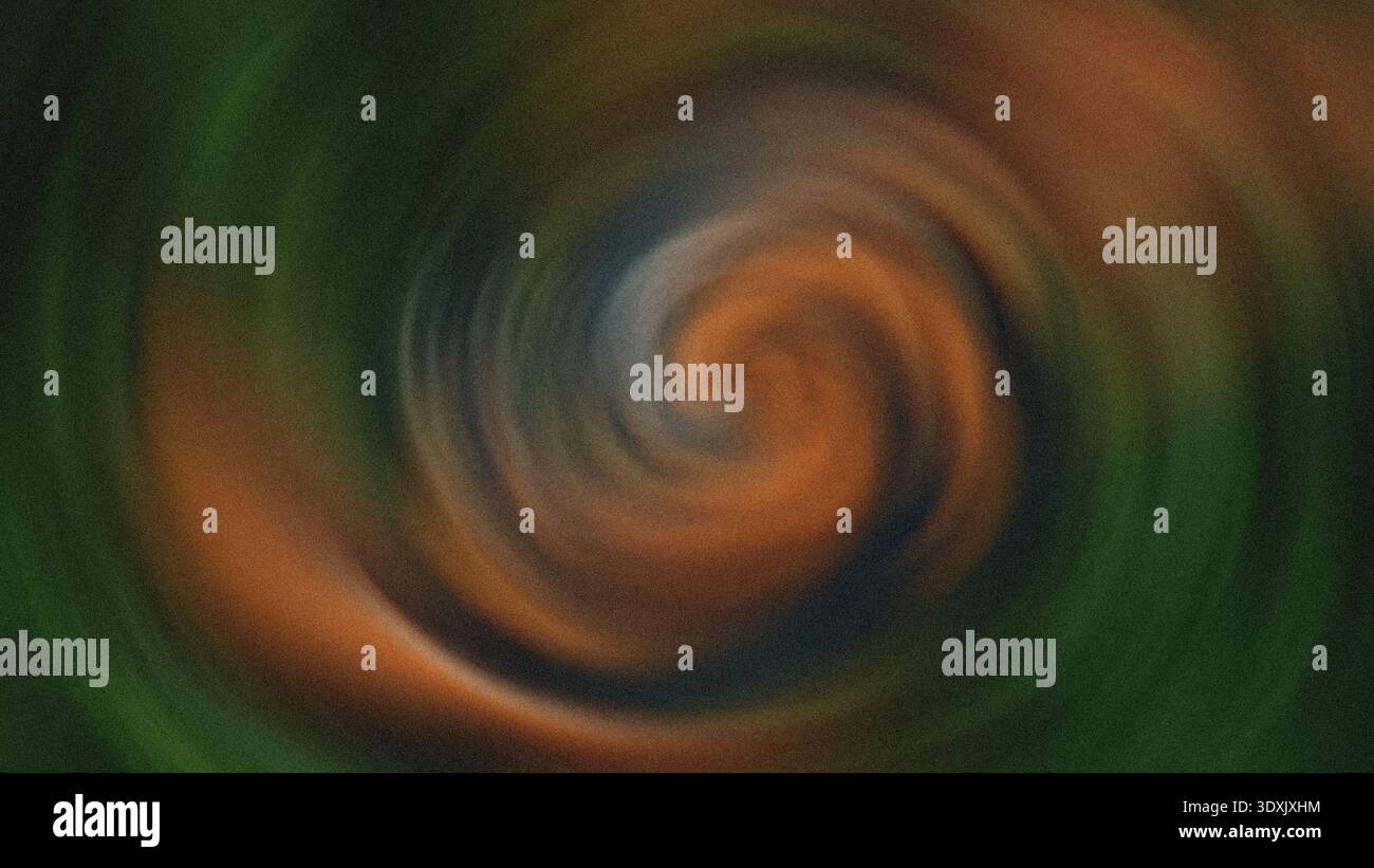 Ein abstrakter Wirbel aus Orange und Grün erzeugt ein dynamisches und verschwommenes Design mit kreisenden Bewegungseffekten Stockfoto