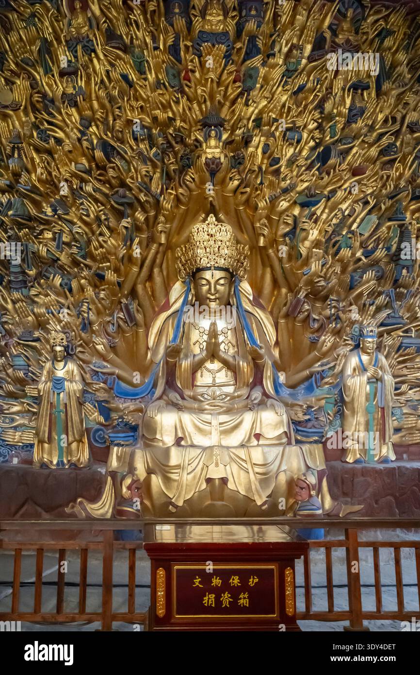 Thousand Armed Guanyin in Dazu Rock Carvings, Baoding Shan, Dazu Rock Carvings, Chongqing, China. Stockfoto