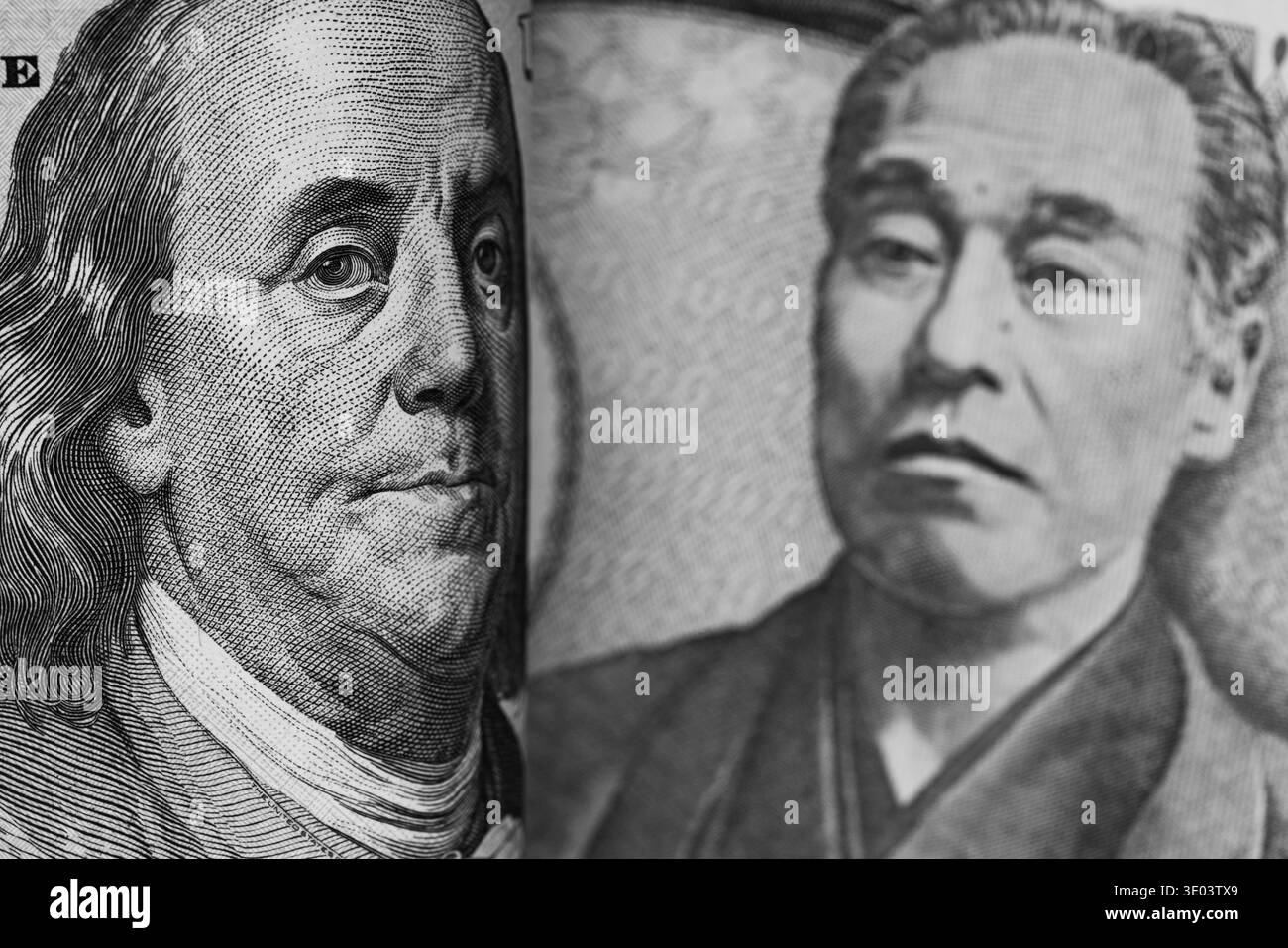 Makroansicht von Porträts auf US-Dollar- und japanischen Yen-Banknoten Stockfoto